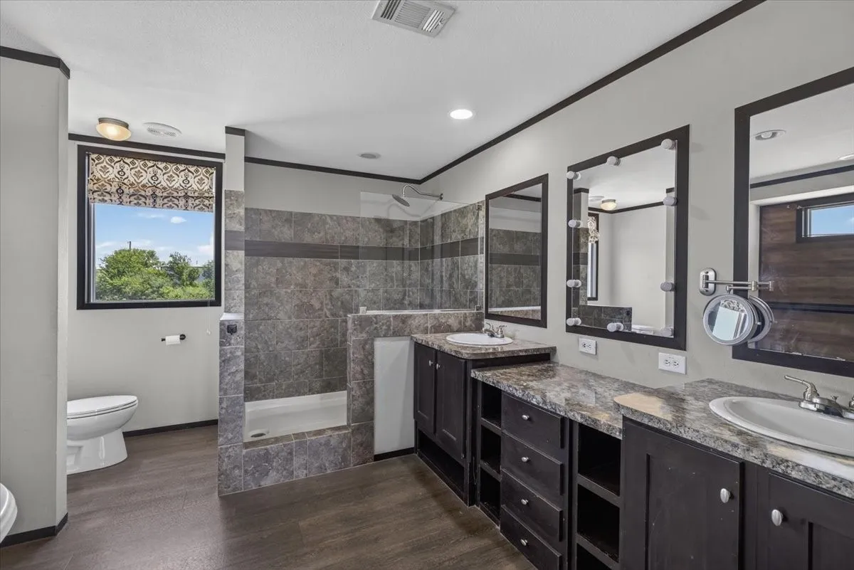 Tiled separate shower, double sinks and separate tub.  Lots of space, you will love it