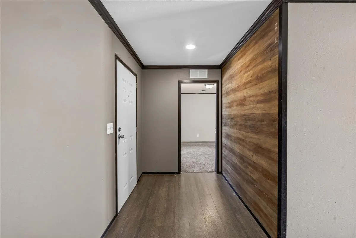 Entry with wood accent on the wall
