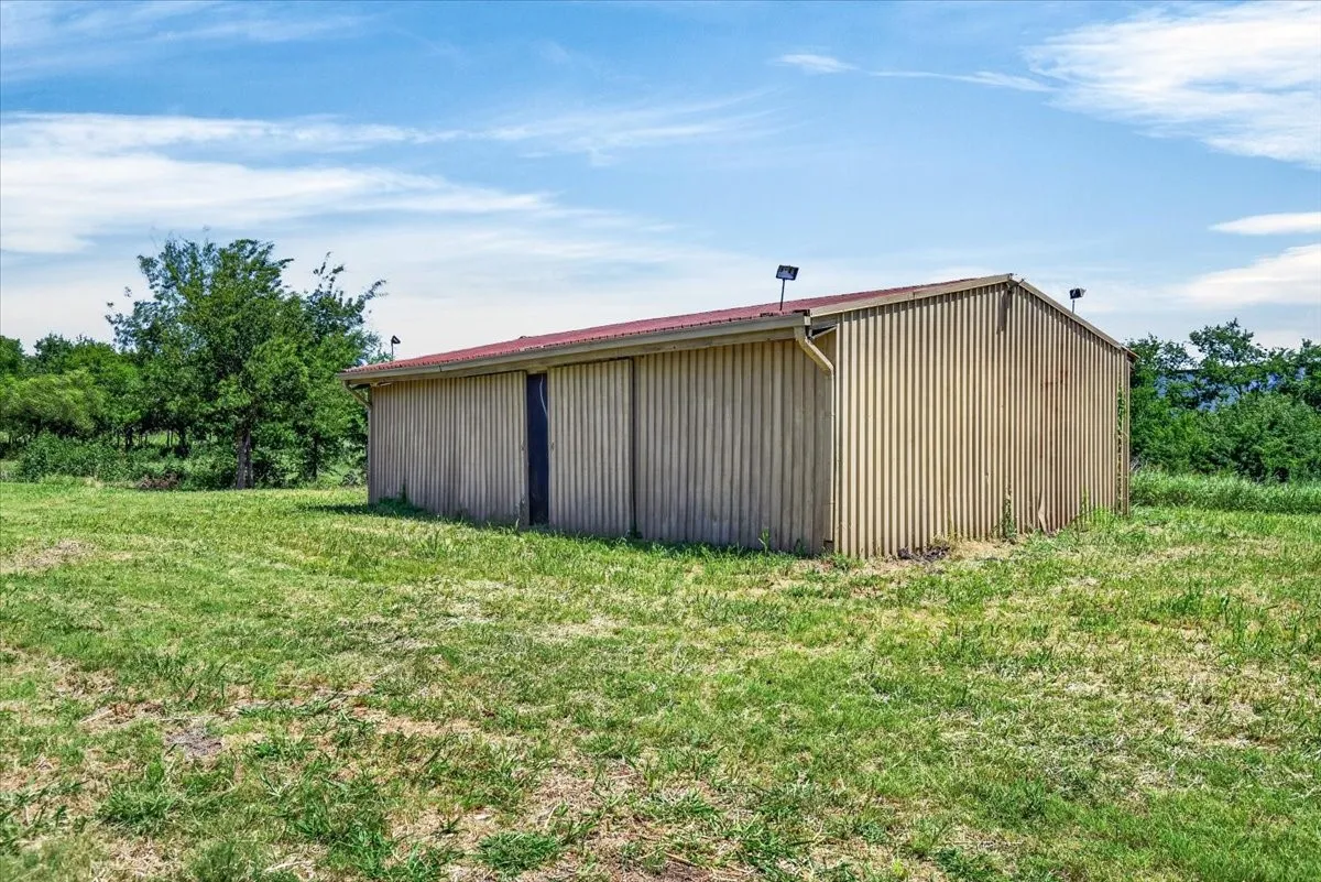 metal storage building, has dirt flooring