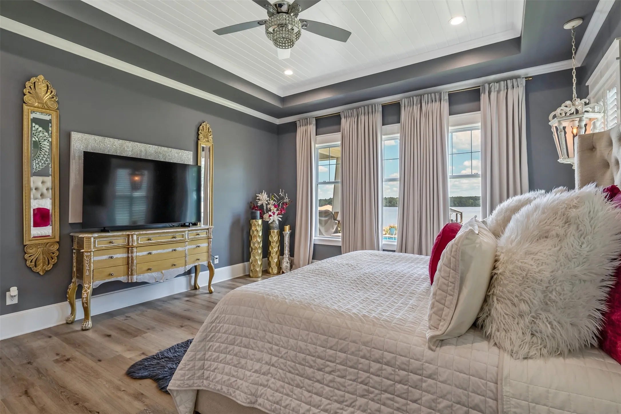 Tray ceiling with white shiplap inlay and recessed lighting