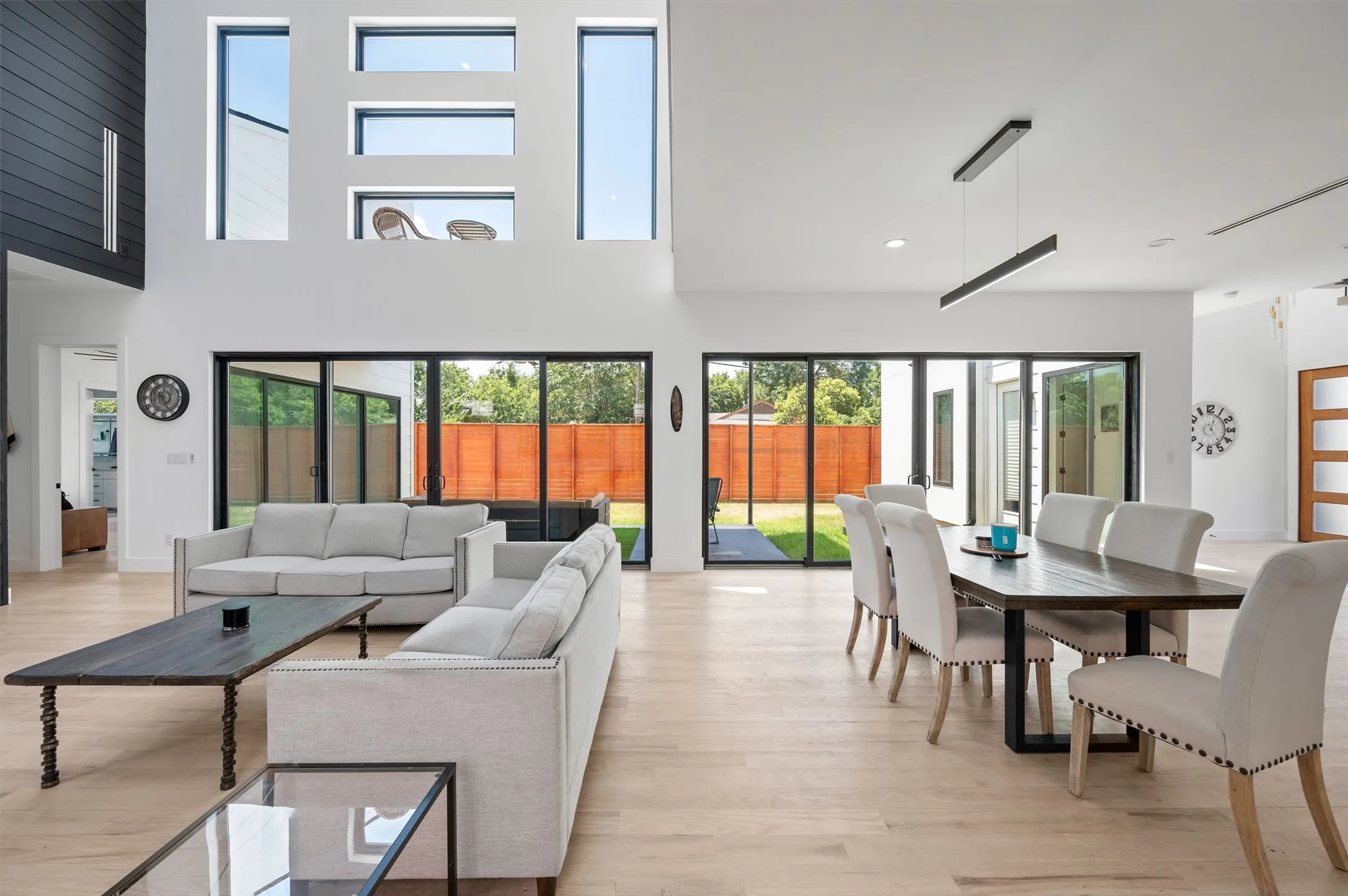 Designed For Entertaining, The Spacious Living And Dining Areas Flow Effortlessly To Covered Patios Through Walls Of Sliding Glass.