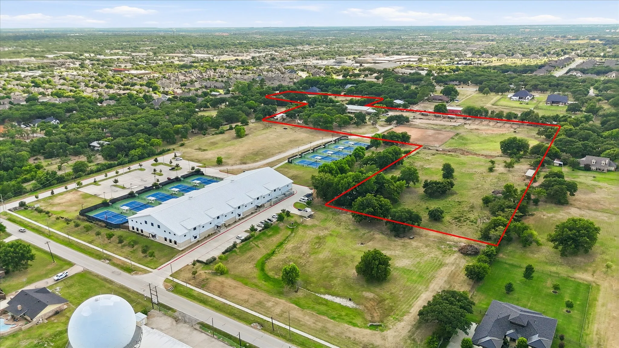 Looking southwest from Keller Smithfield. The boundary on the southwest of image is Johnson Rd frontage.