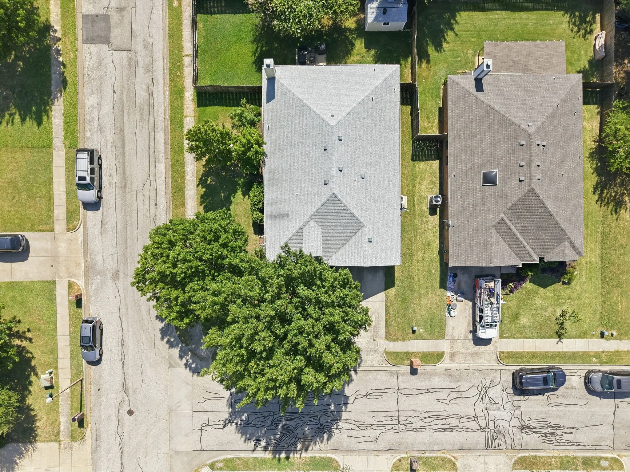 Well landscaped corner lot with shade trees
