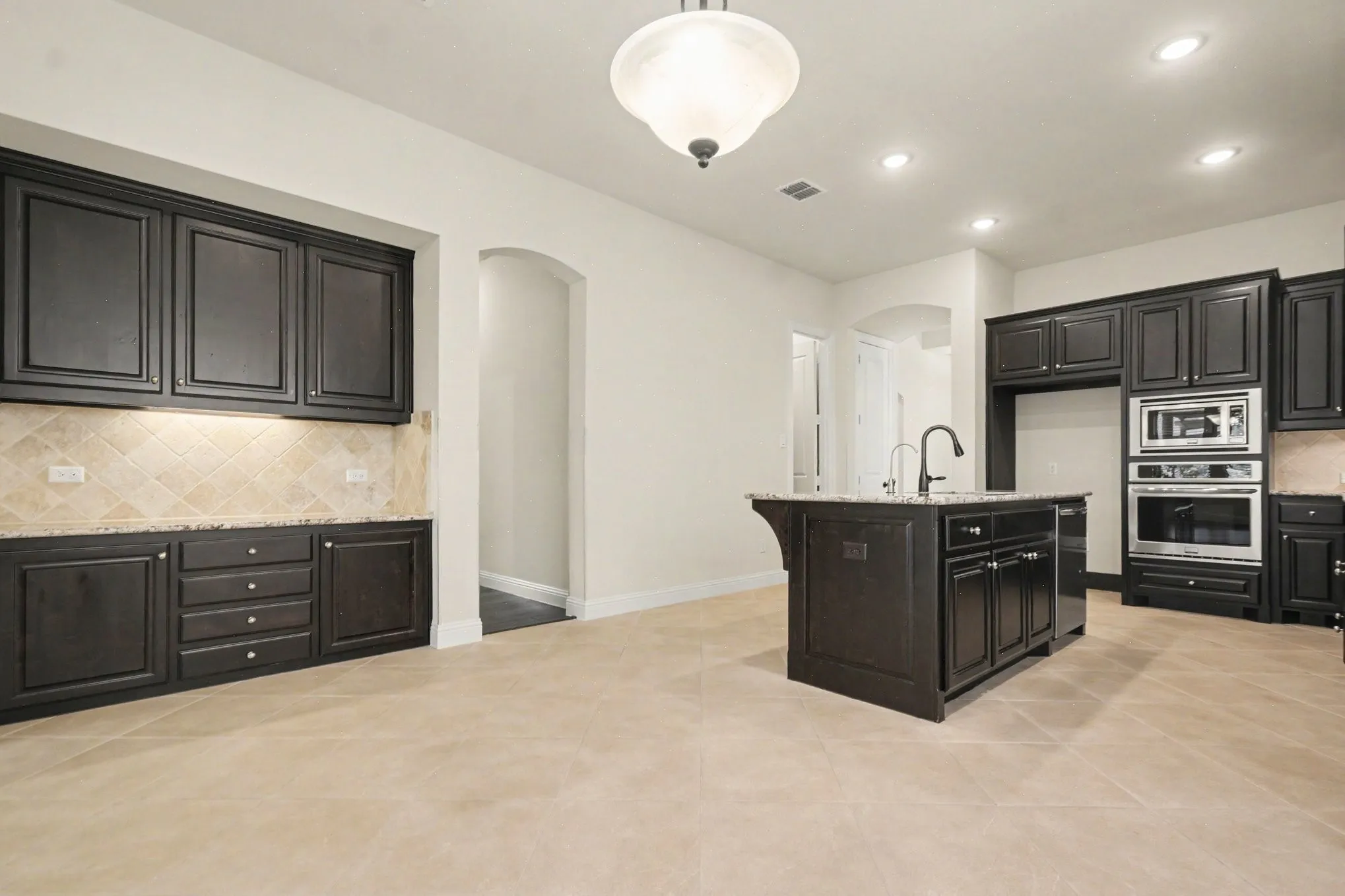 Open Floor Plan. View of Family Room from Kitchen