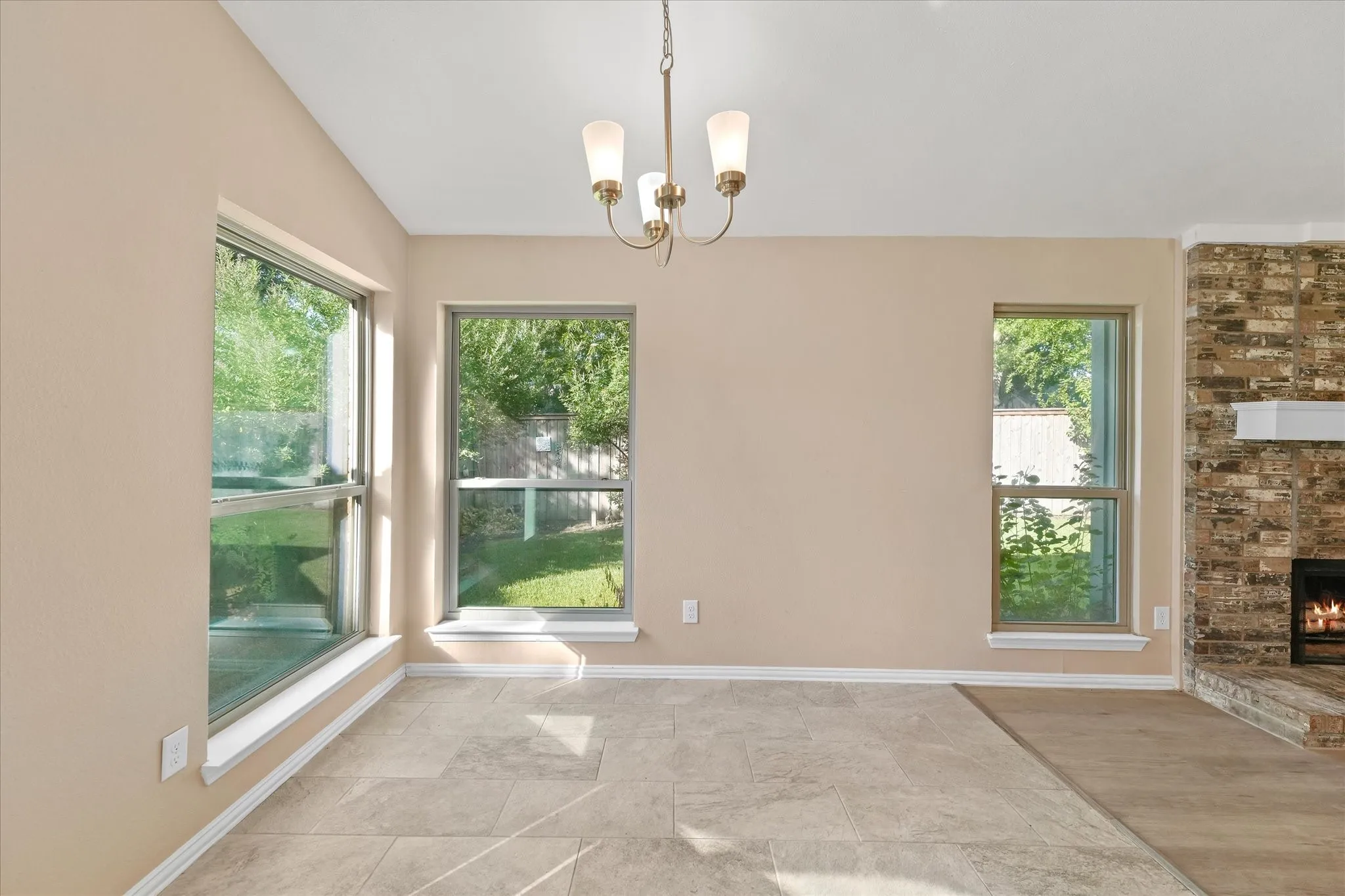 Eat in kitchen area with new energy efficient windows bringing in natural light
