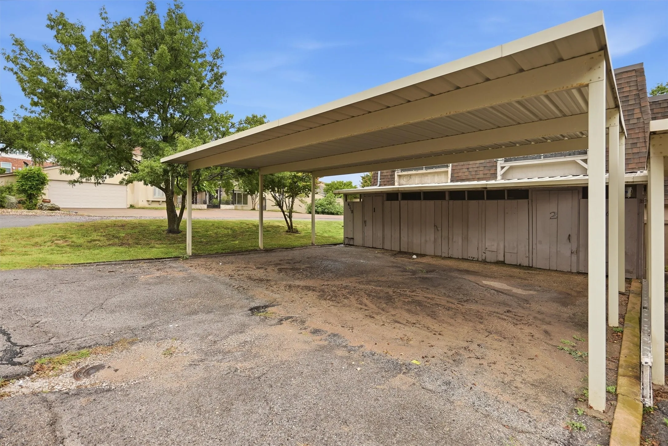 Open-air carport providing covered parking