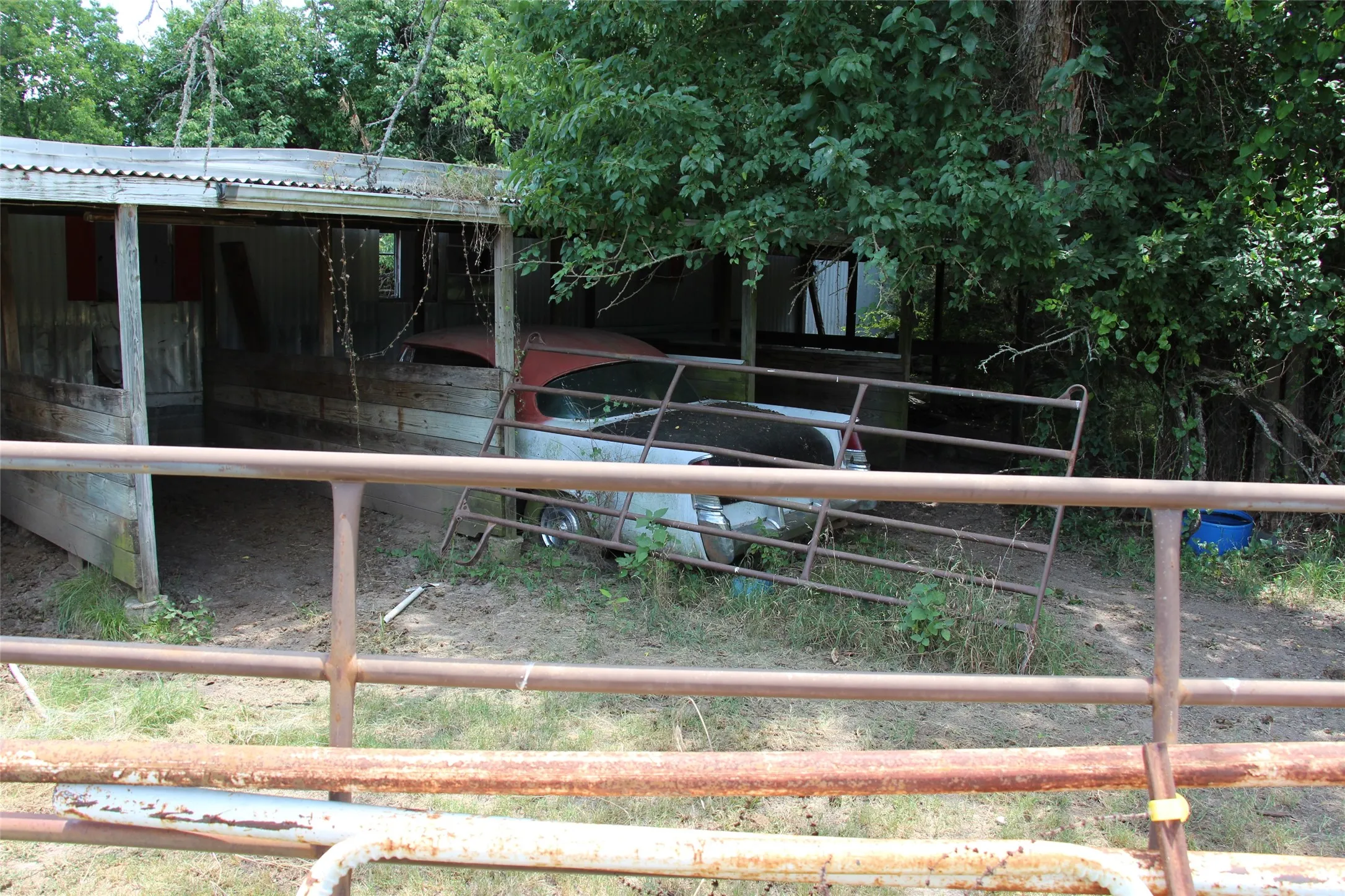 Horse stalls with hay storage