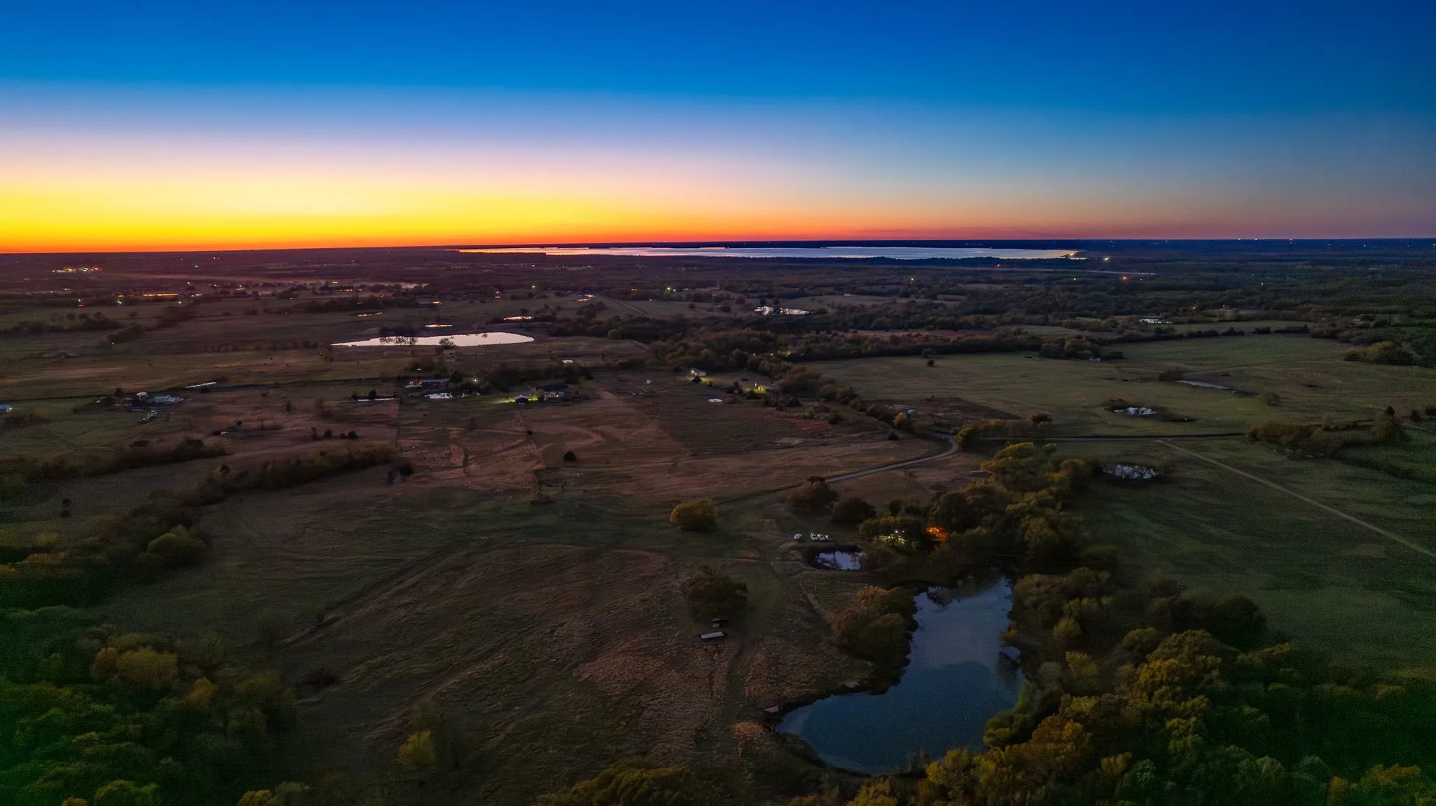 Aerial view at dusk with a water view