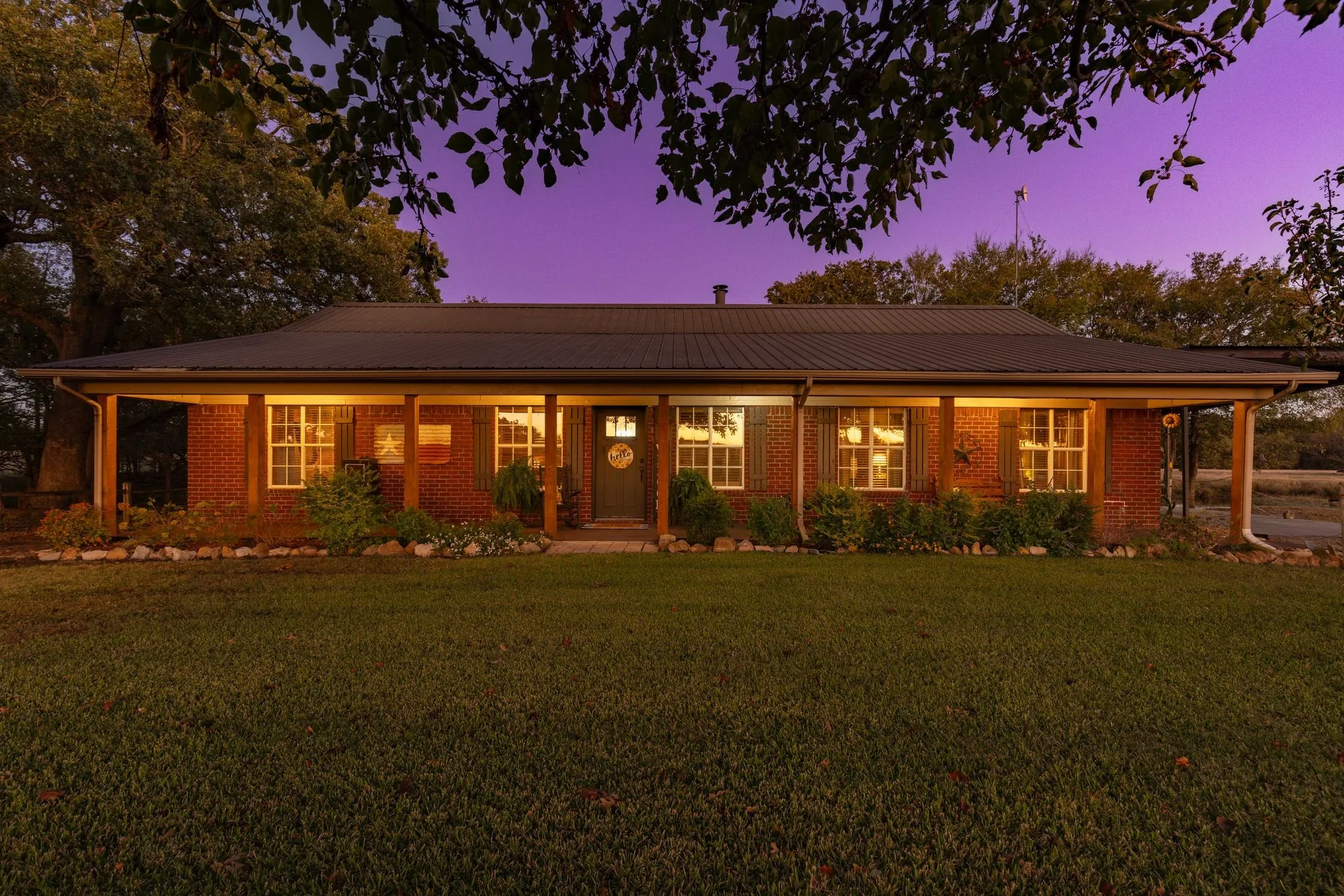 Ranch-style home featuring a yard