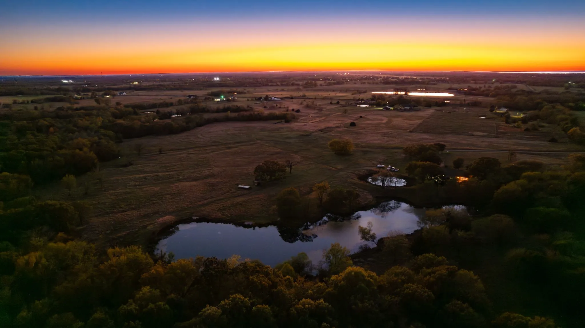 Aerial view at dusk with a water view