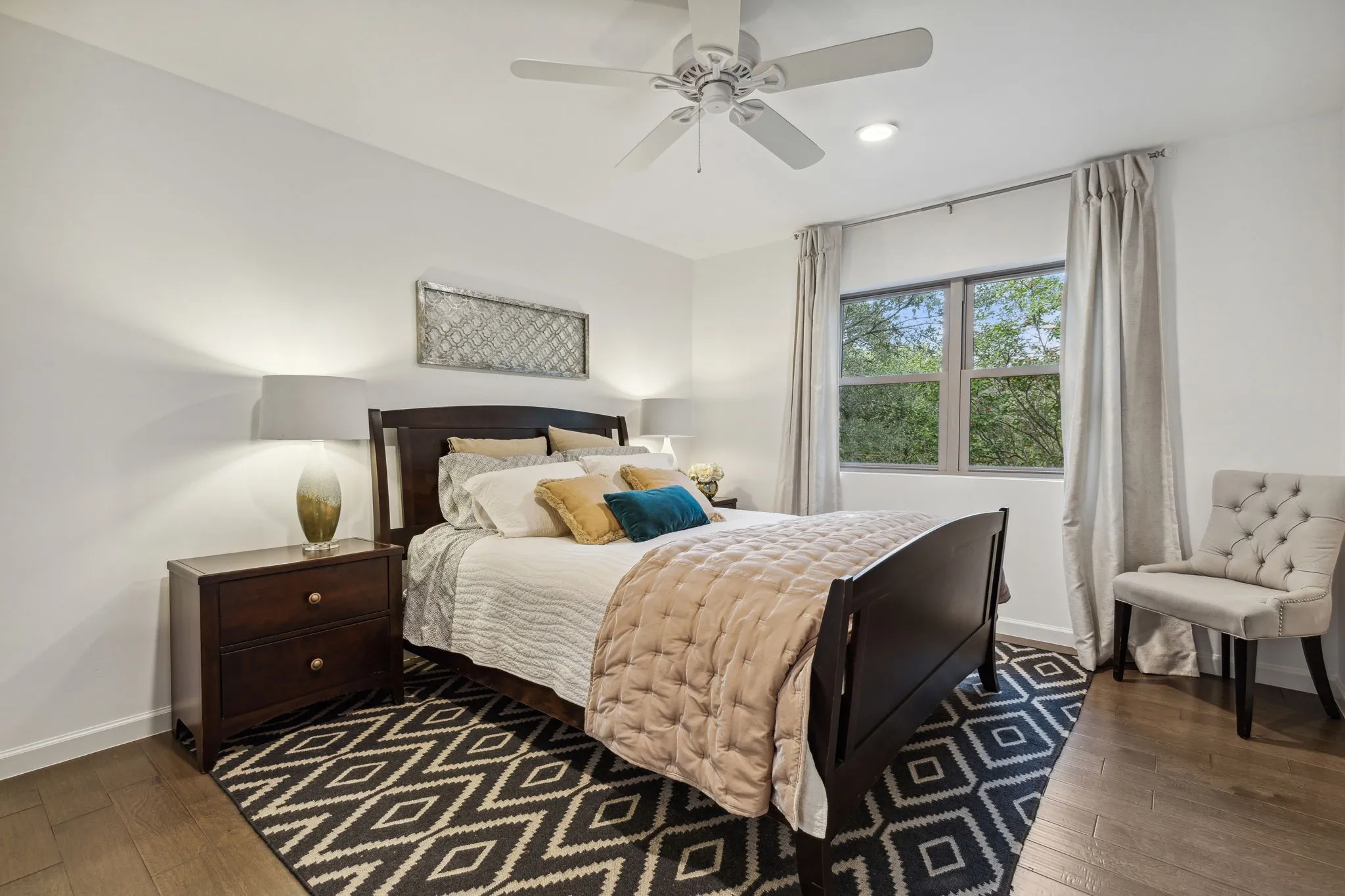 Bedroom with jack & jill bathroom access and custom walk-in closet