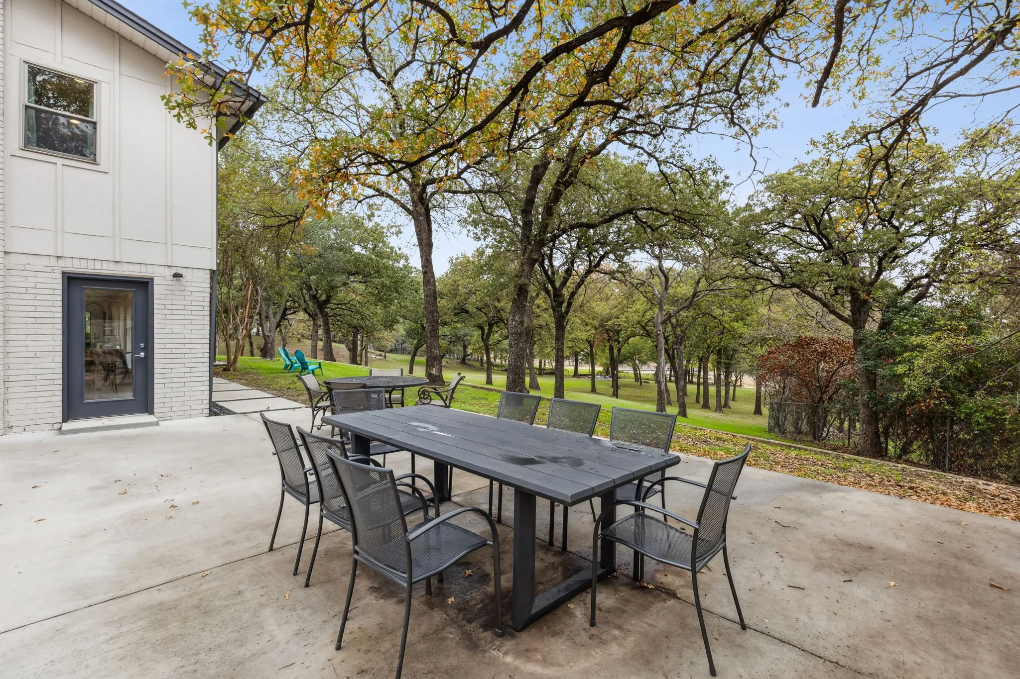 BBQ side yard patio overview of the gardens