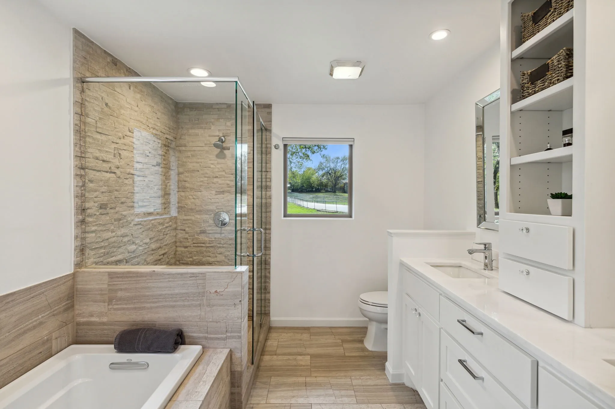Full bathroom featuring double vanity, independent shower and bath, valentina marble  floors, marble countertops