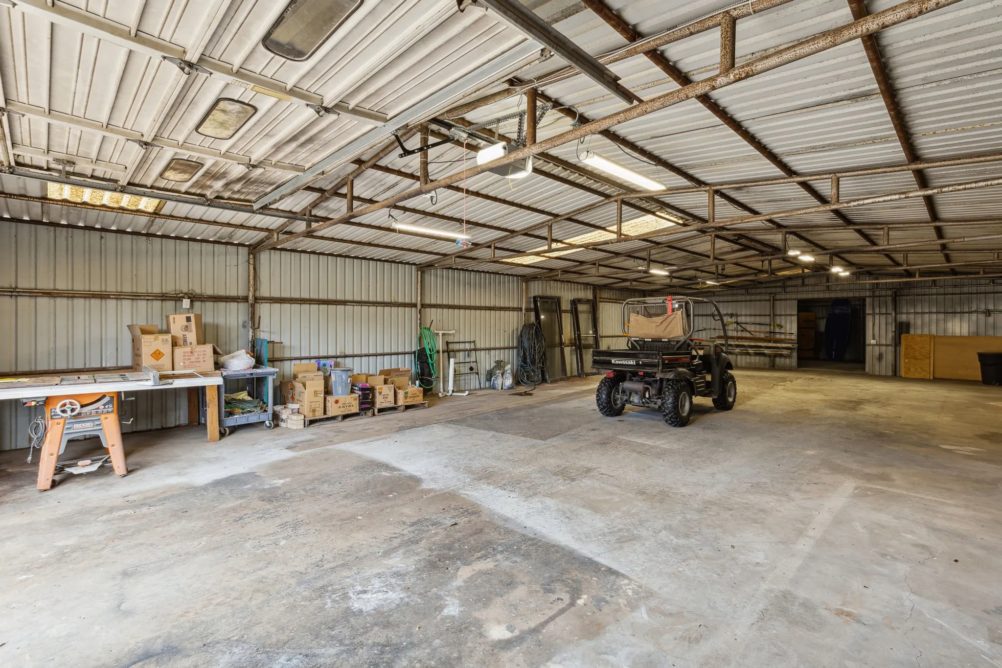 2300 sq ft Garage / Workshop with sliding side doors and automatic garage door opener
