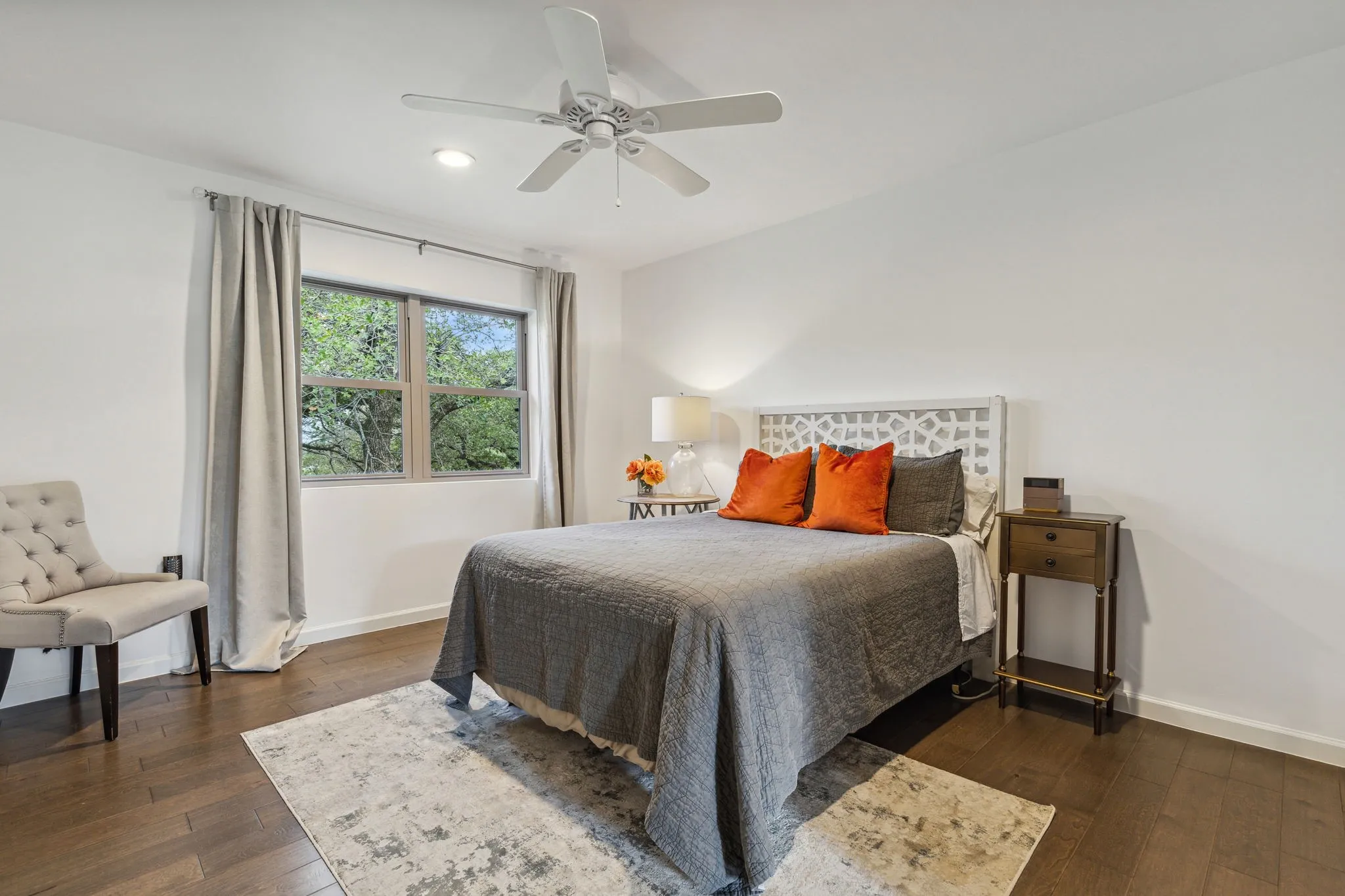 Bedroom featuring jack and jill bathroom access and a custom walk-in closet