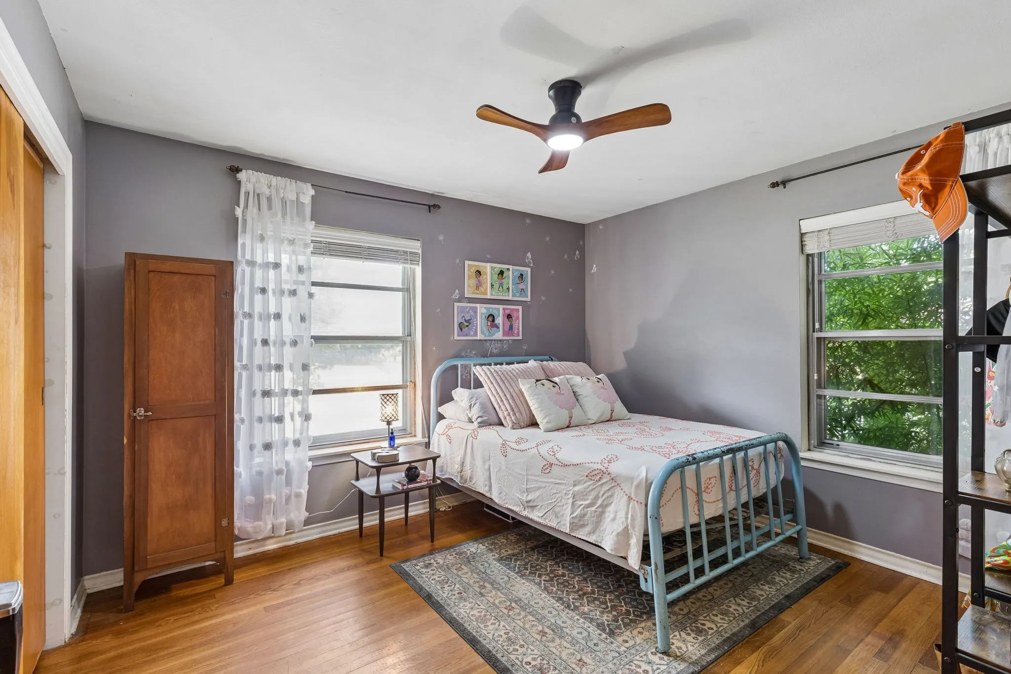 Spacious third bedroom with tons of natural light and beautiful solid wood floors.