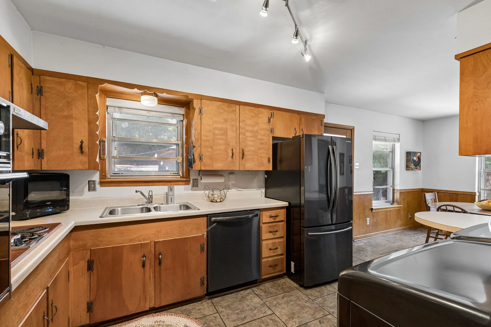 Kitchen is clean and has an efficient layout.