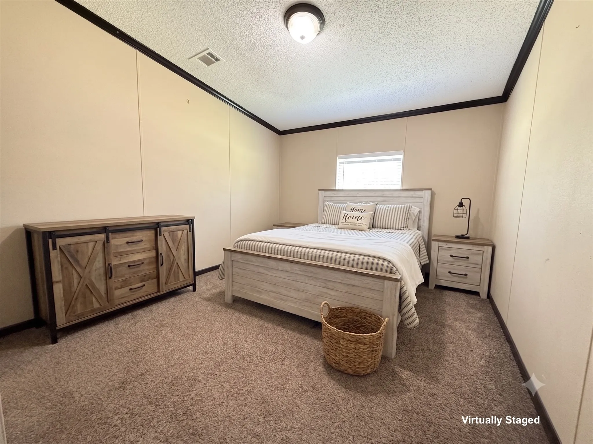 Neutral wall tones with dark trim, overhead lighting, and a single window