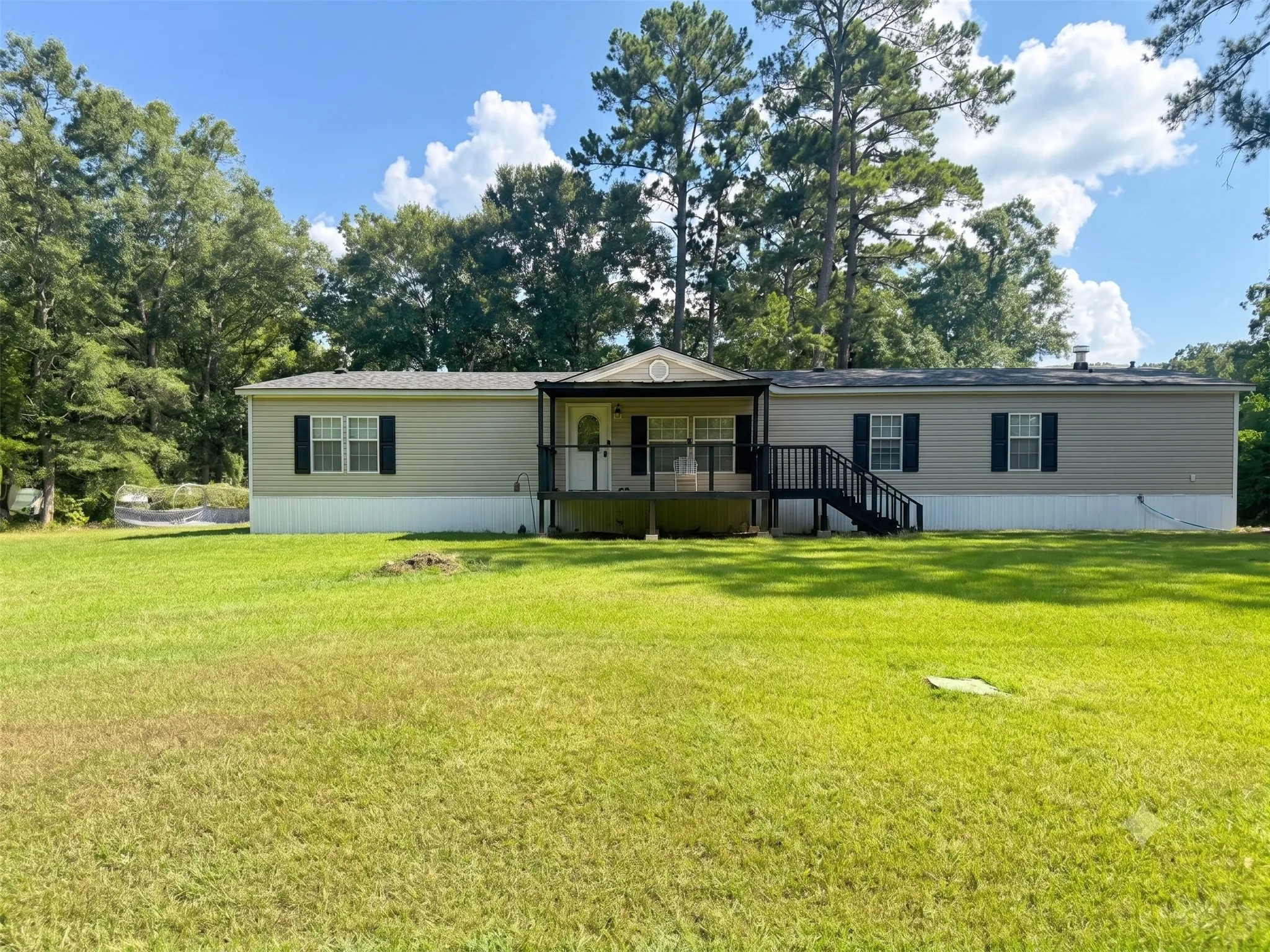 Mobile Home For Sale in Henderson County , 20970 Lee Lane, Chandler, Texas 75758, 4 Bedroom, 2 Bathroom, Garage spaces, 2,400 Sqft, built in 2009, mls#21296936, Real Estate Agent in Chandler, Homes For Sale in Henderson county, Homes For Sale in Chandler, Realtor in Chandler Texas, Real Estate Brokerage Independent Realty Texas, Luminita Cordes Realtor