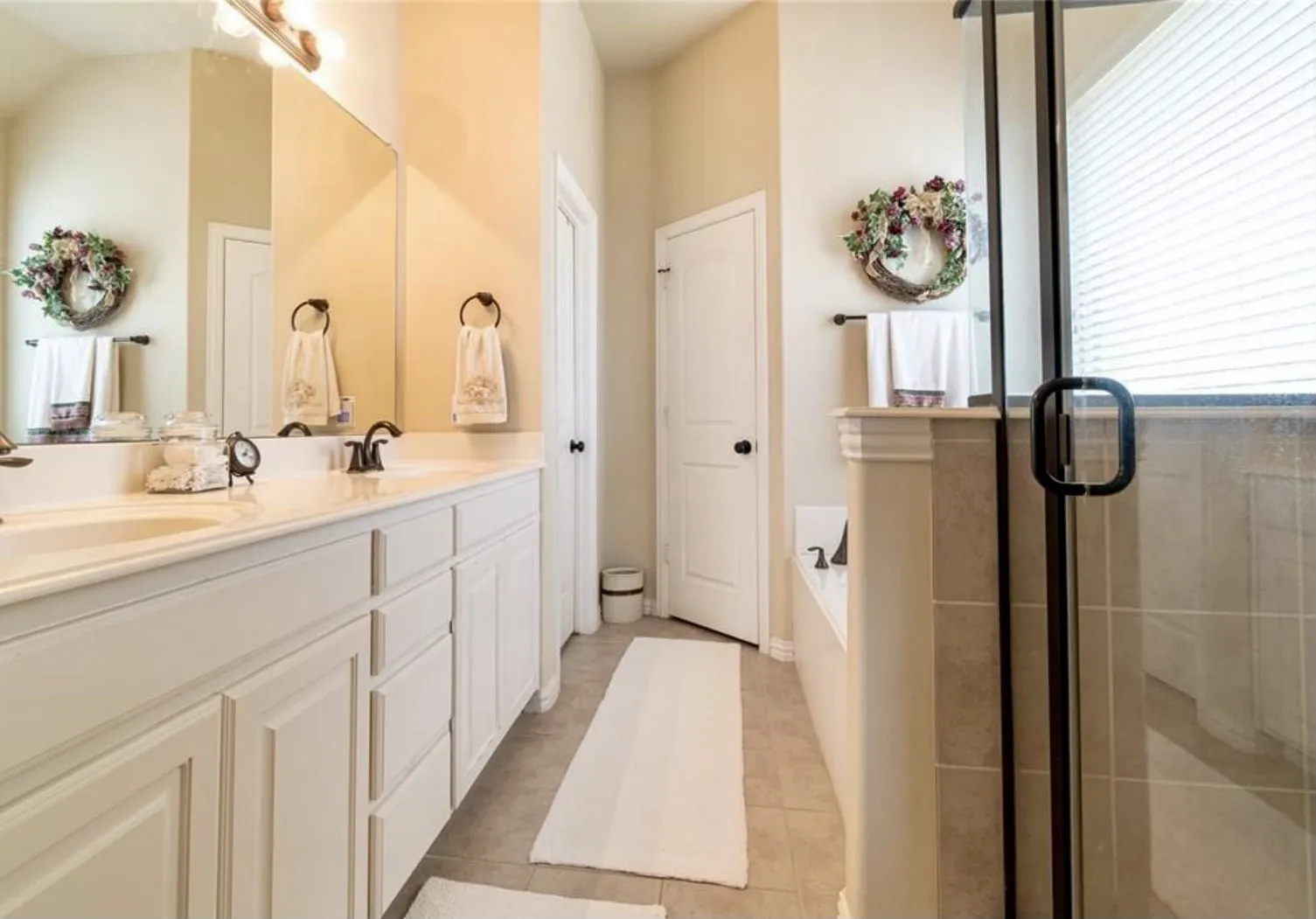 Master Bathroom with dual vanities and separate shower/tub