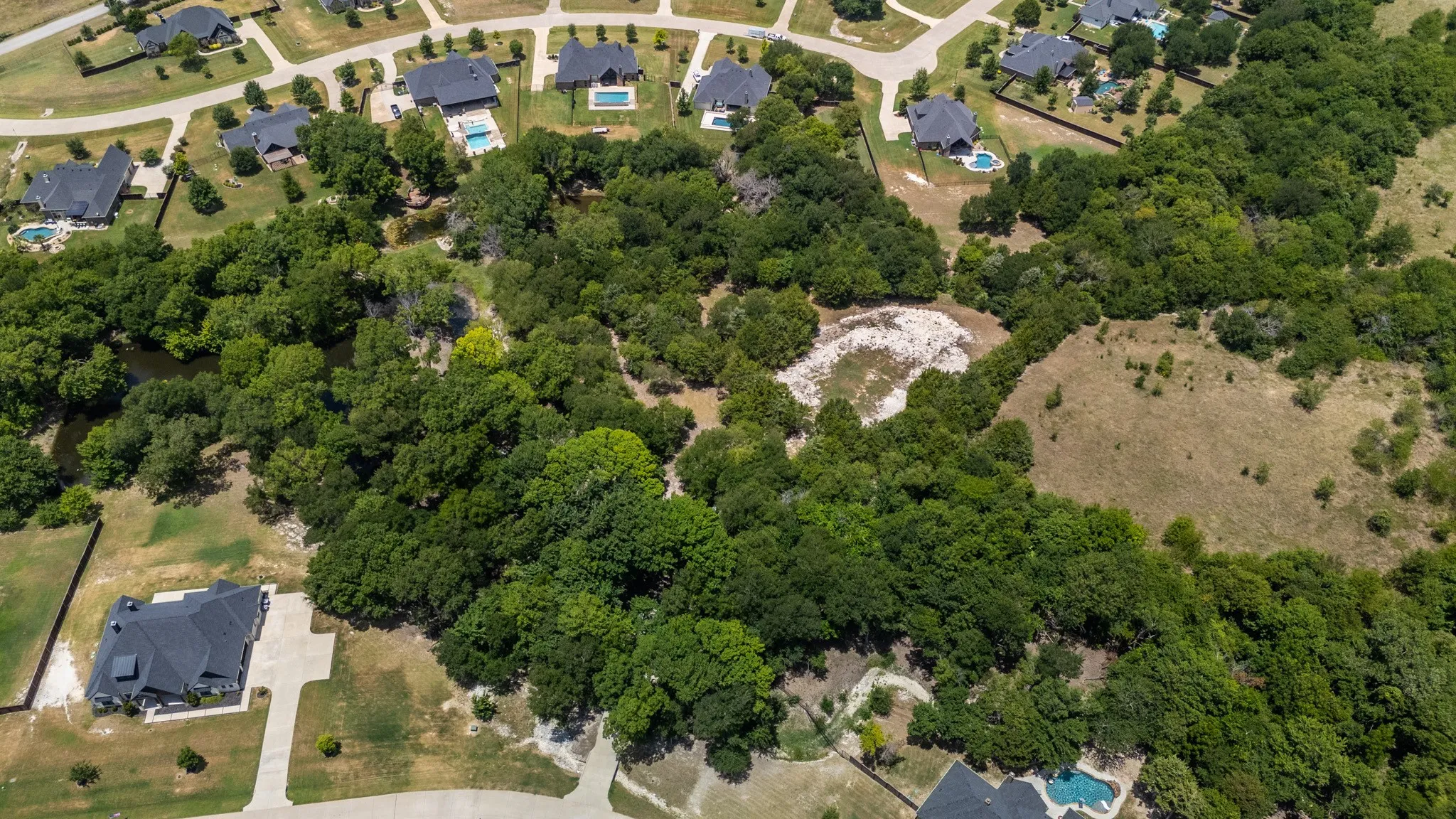 Expansive wooded lot offering privacy and natural surroundings