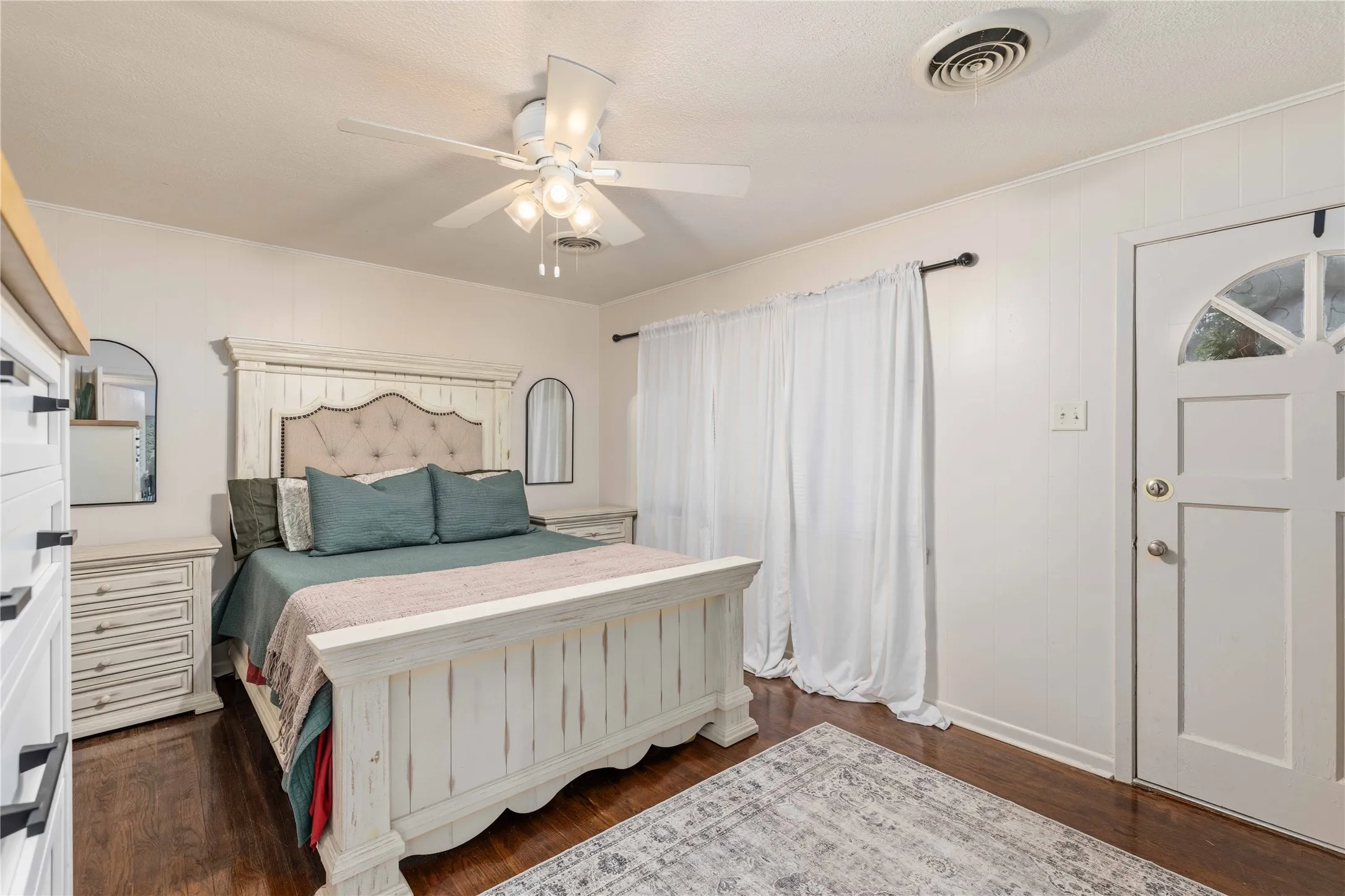 Bedroom #2 with exterior door access to the front of the house