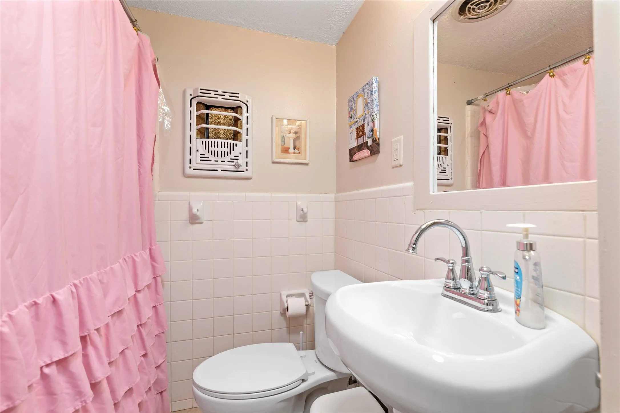 Second bathroom with a tub/shower combo