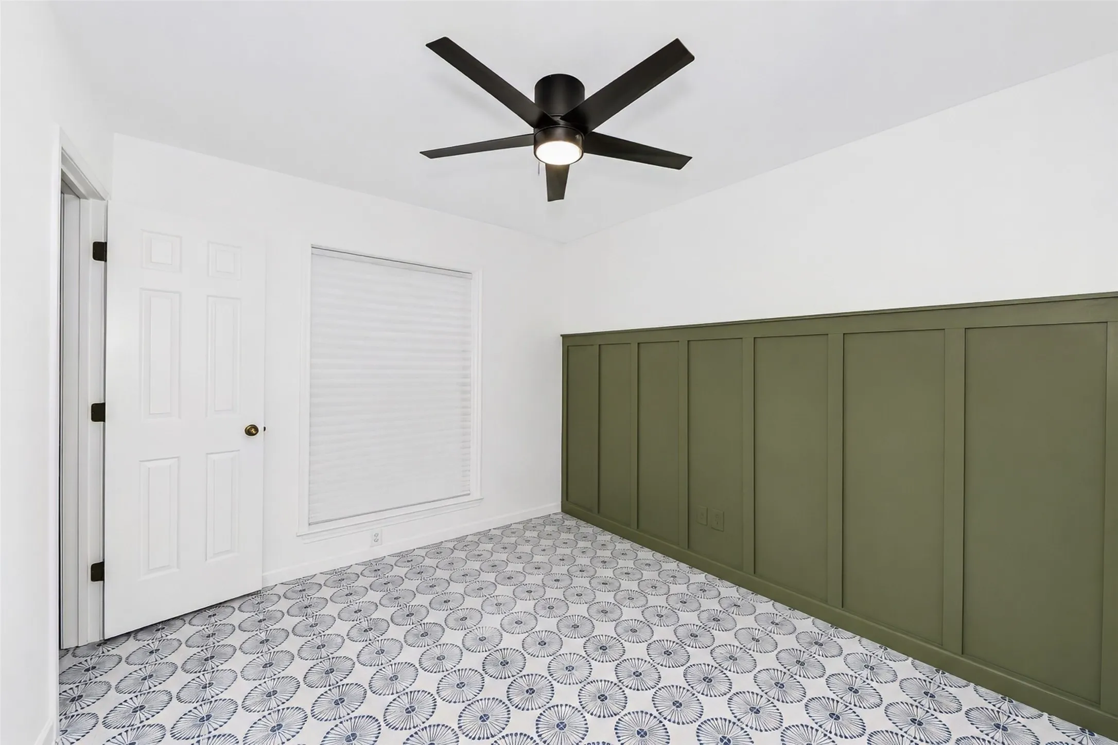 One of the secondary bedrooms has a very nice wood accent wall - 9'1" x 10'