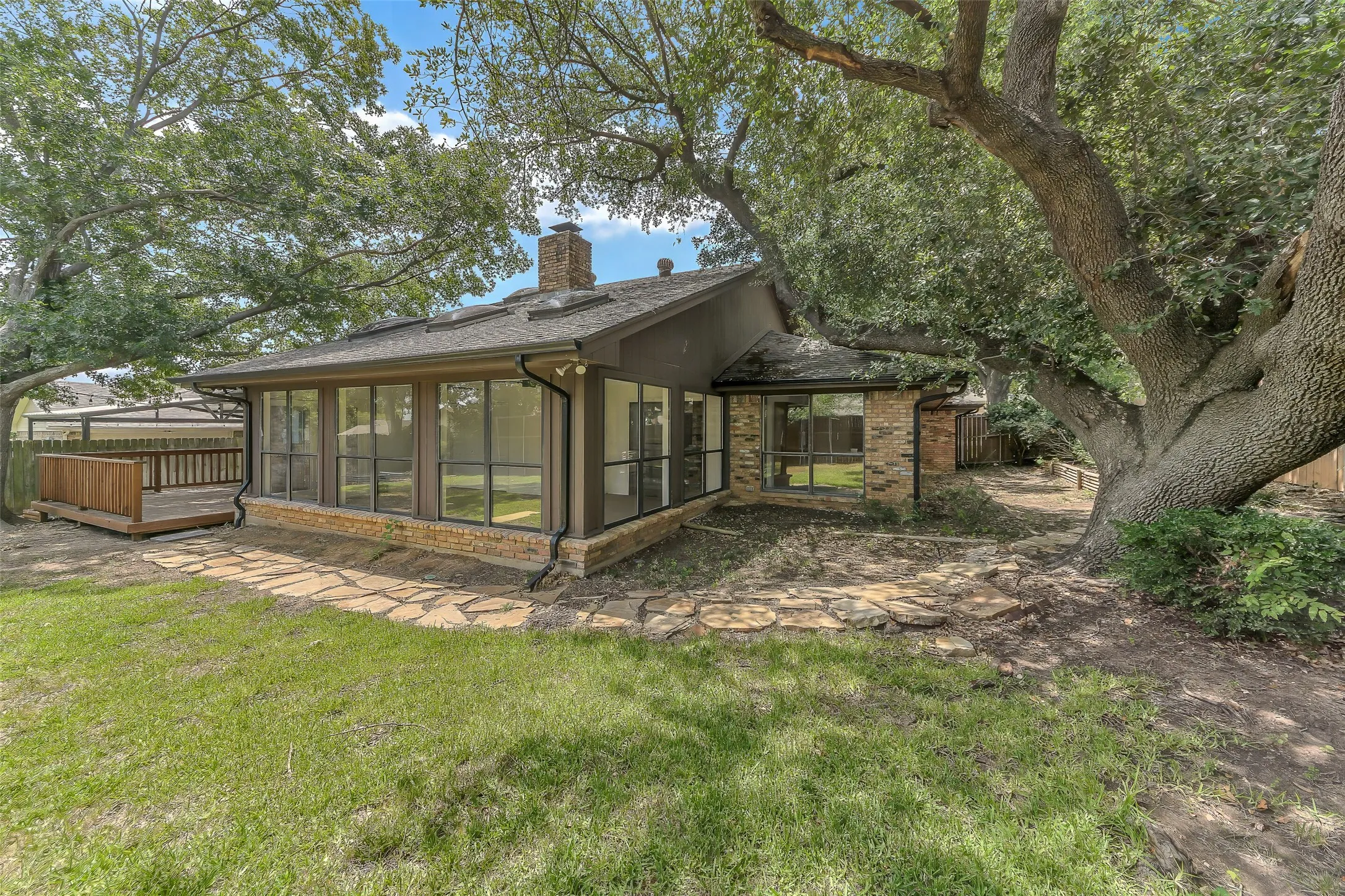 Showing the sunroom from the exterior