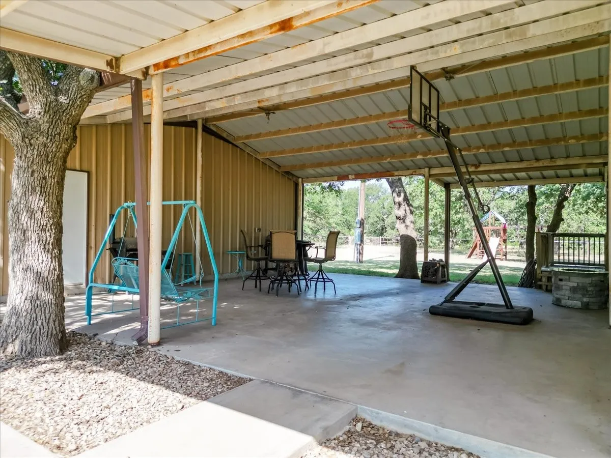 Covered breezeway is a fantastic place to hang out.