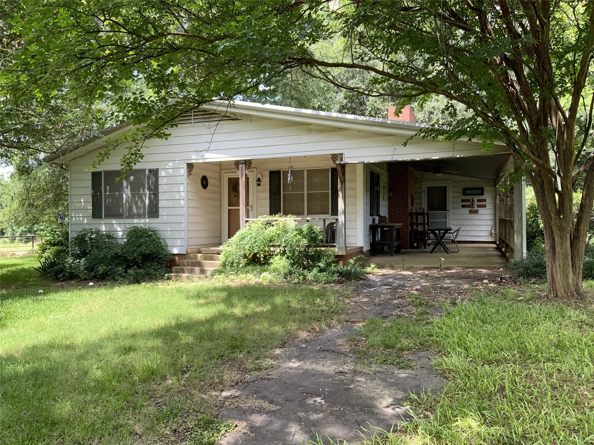 front exterior/attached carport