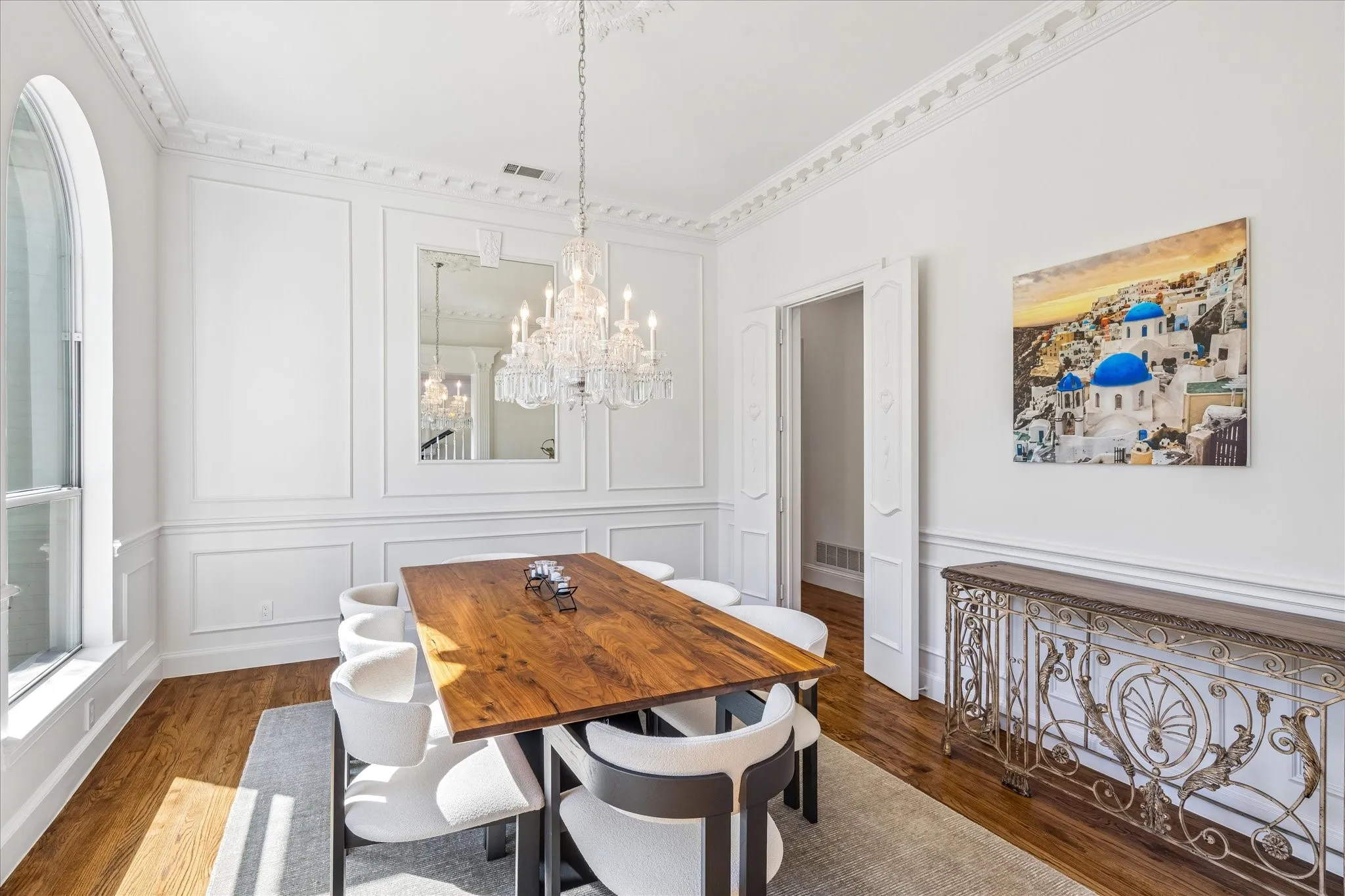 Great detail on the ceiling and walls in this spacious dining room.