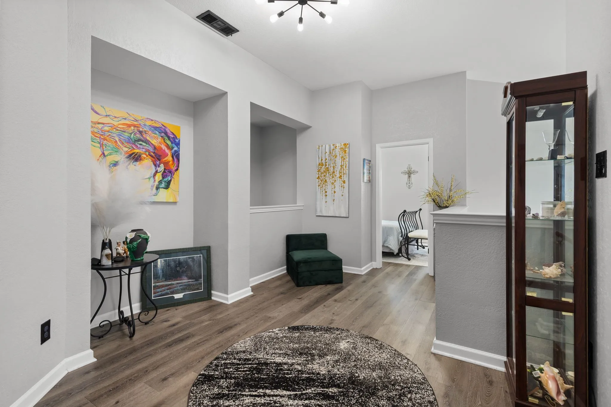At top of stairs, could be Homework Nook, Sitting Room