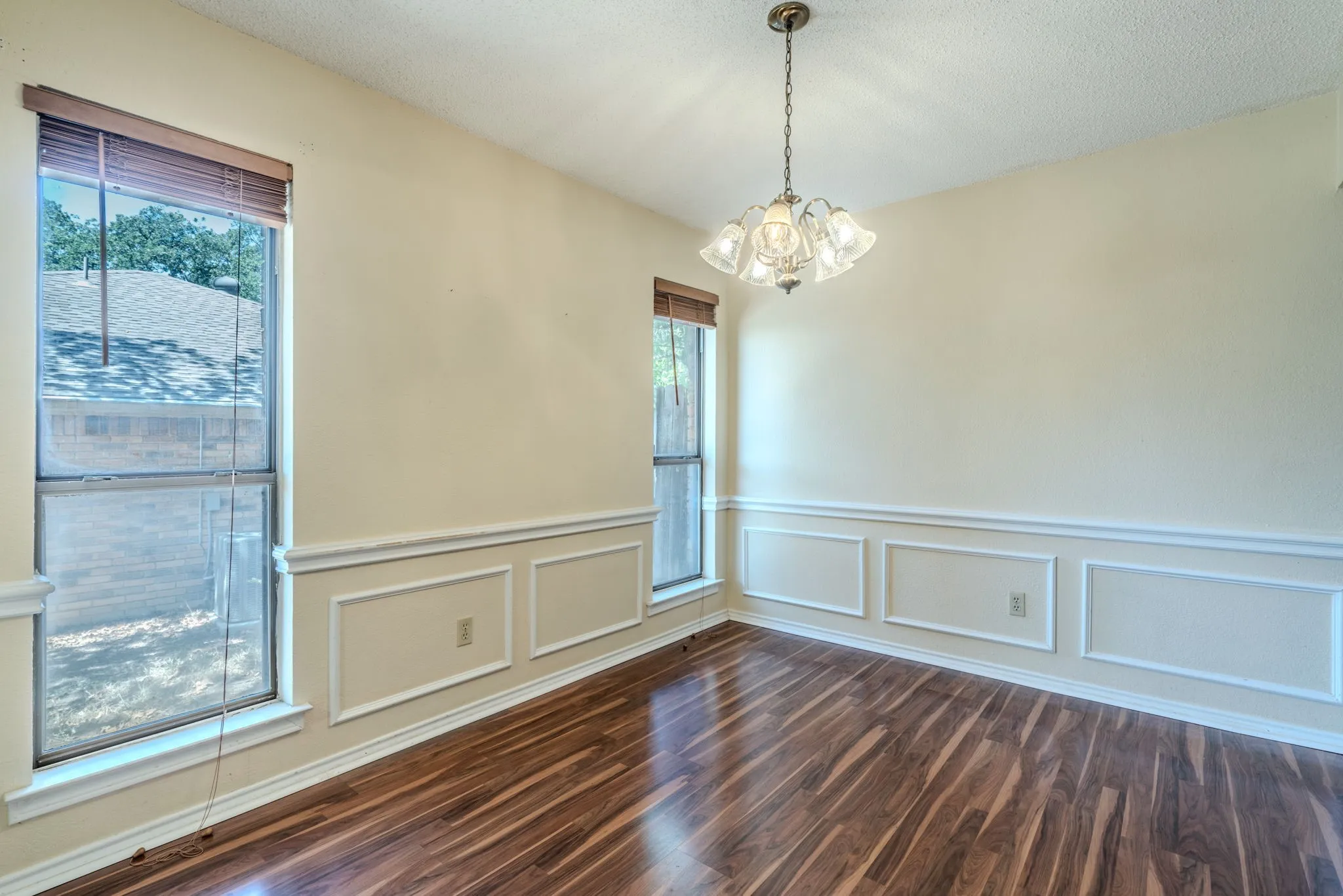 Open-concept floorplan with dining room off of the kitchen and living area.