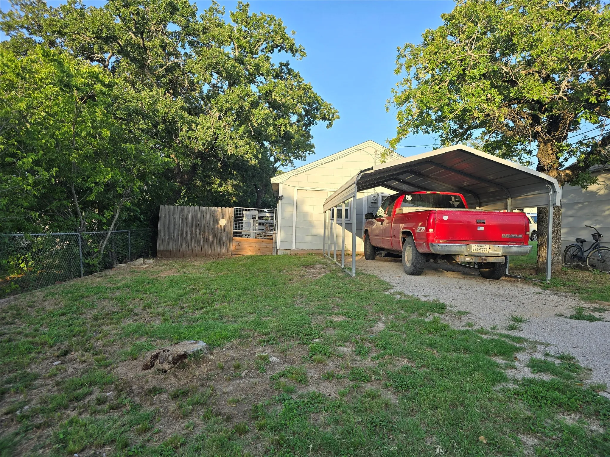 carport , side of yard