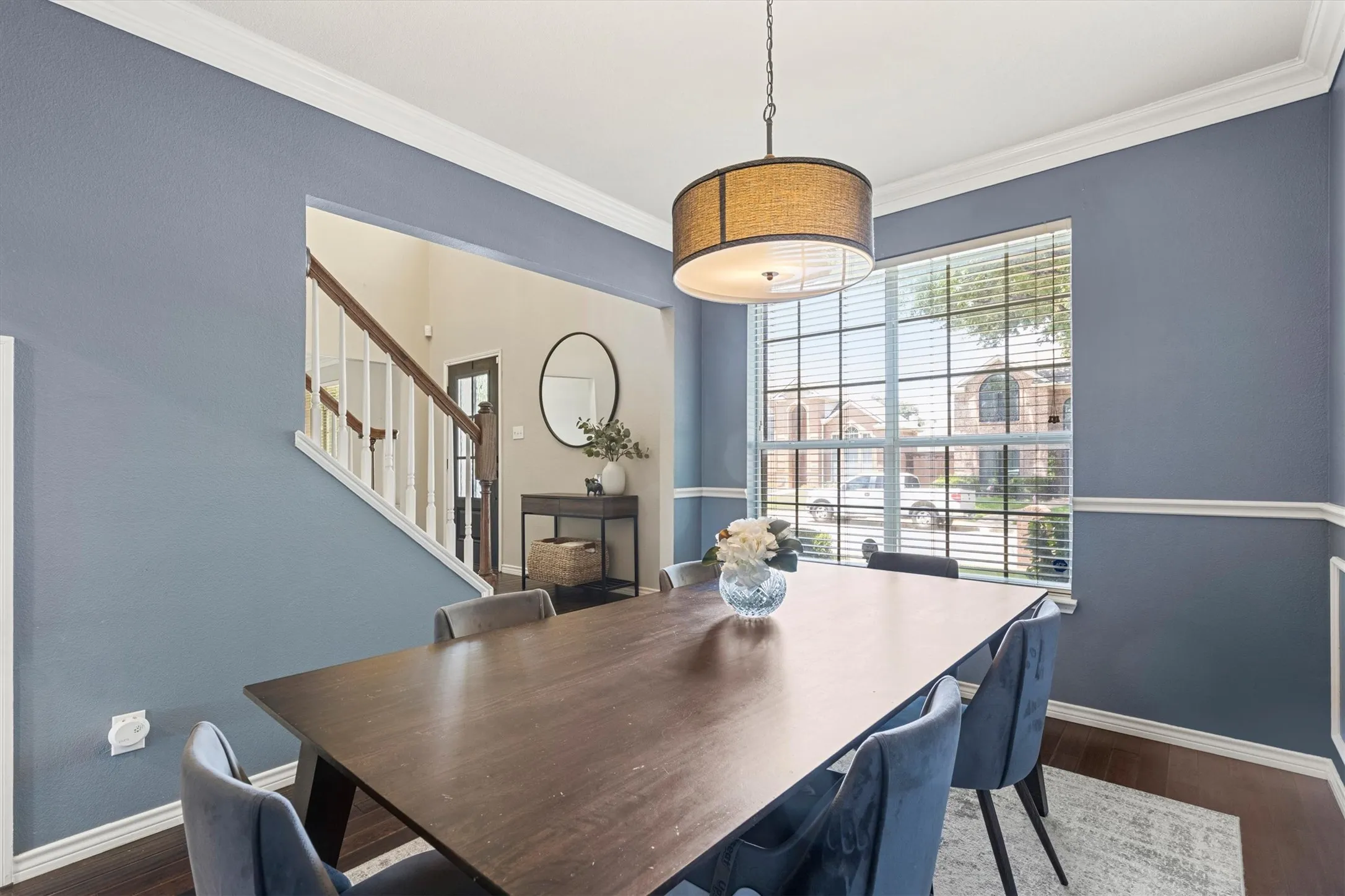 Dining Area with Wood Floors and Entry Way
