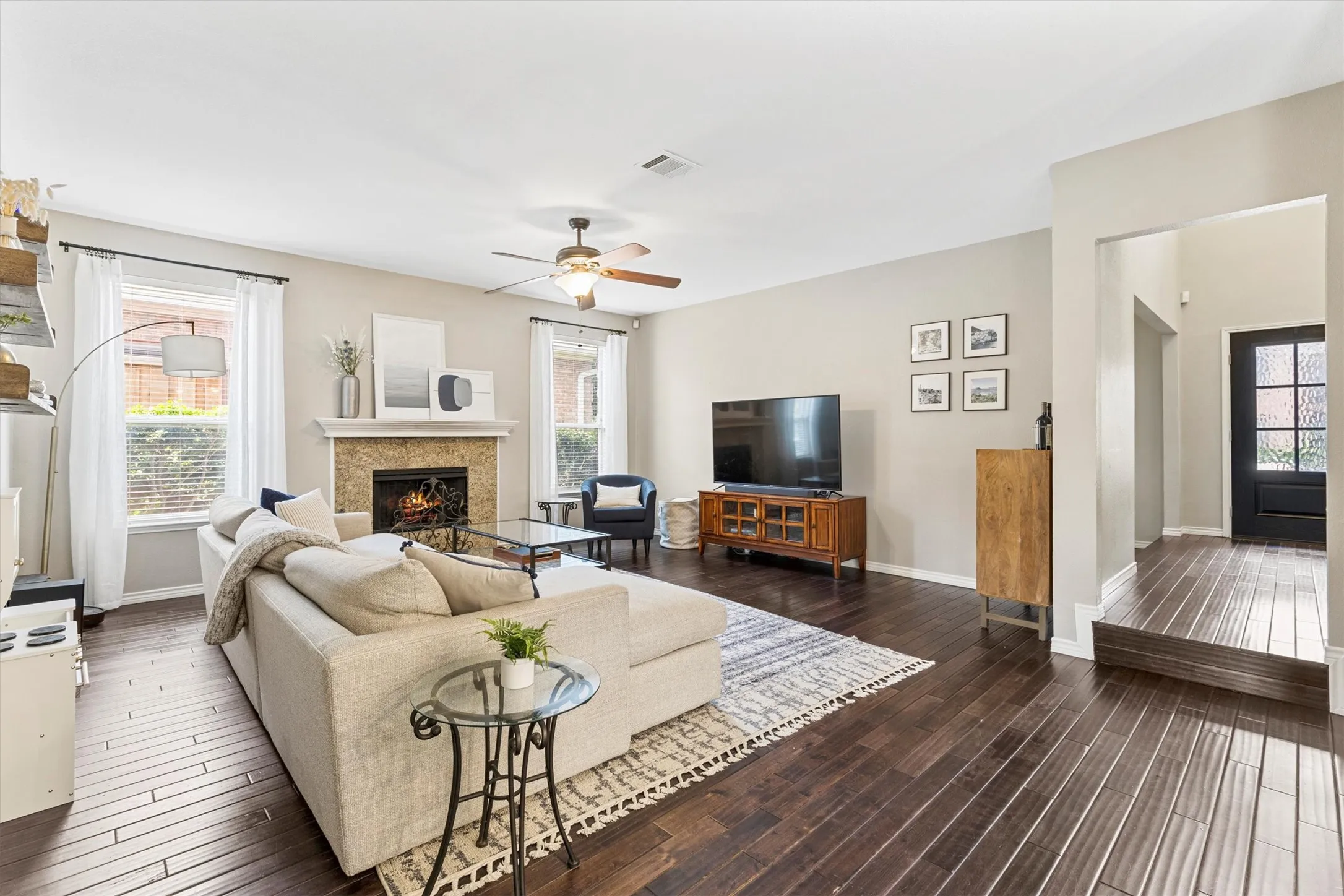 Family Room with Fireplace and Wood Floors