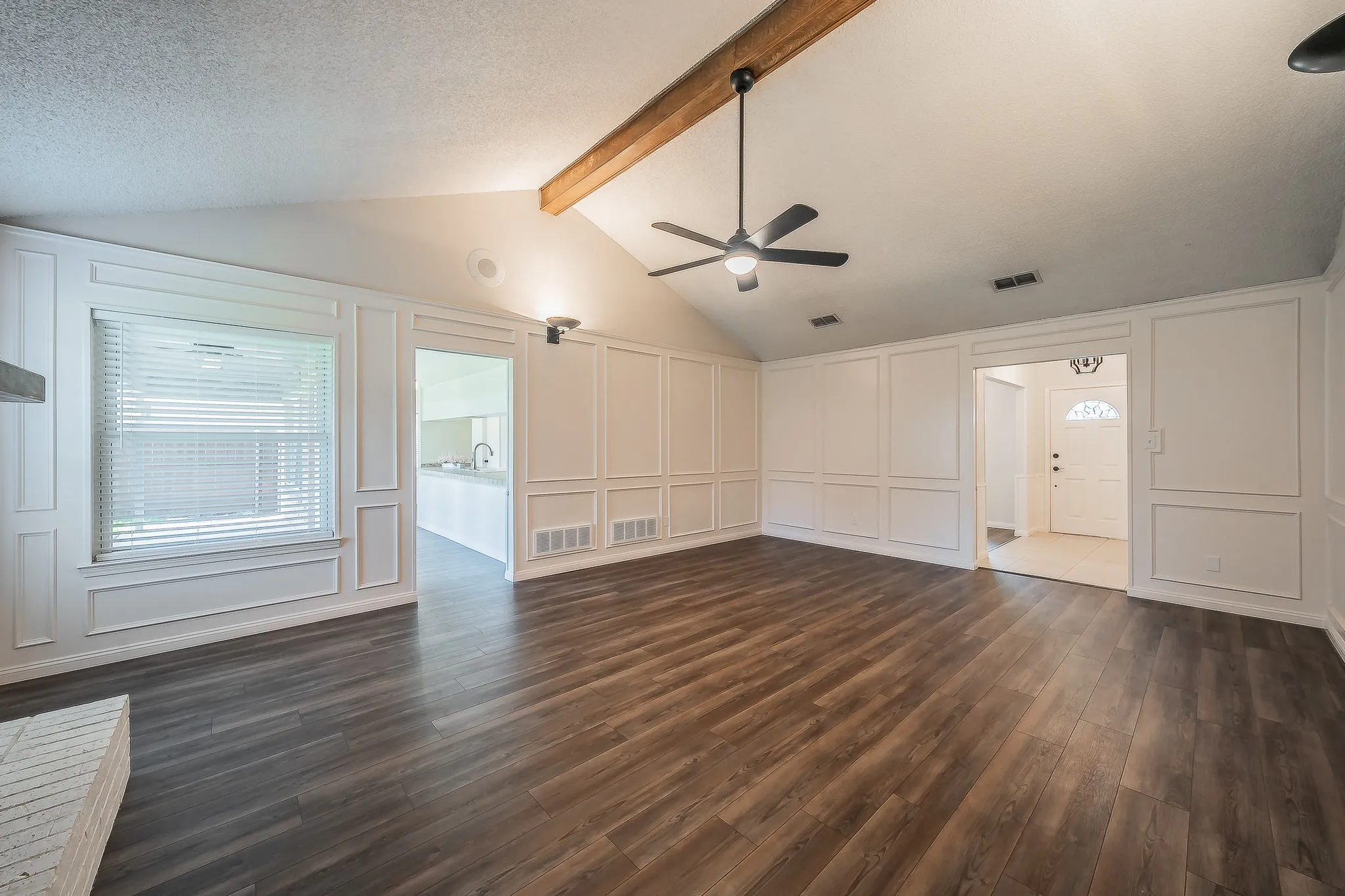 Several windows in the living room offers abundance of natural lighting.