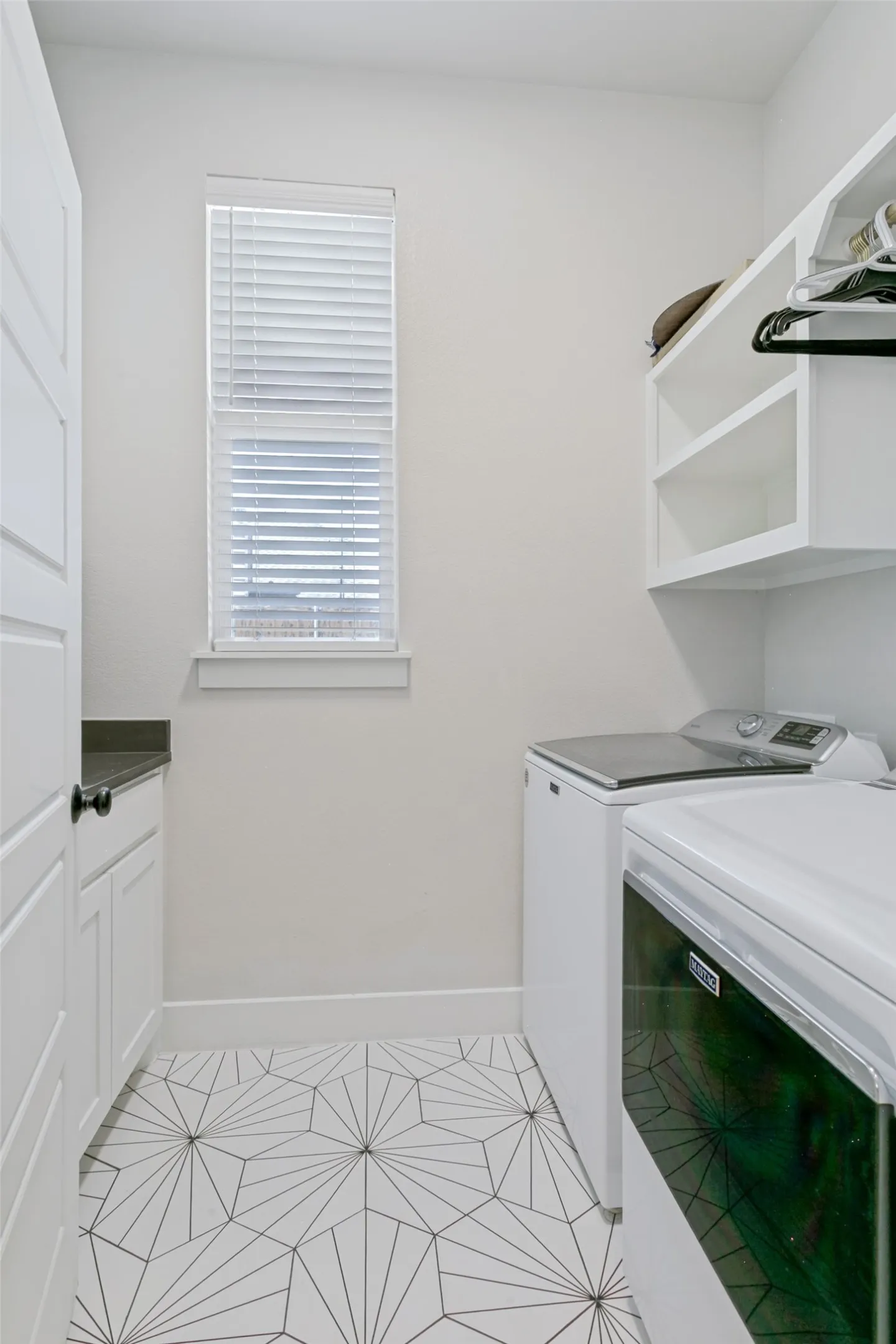 Gorgeous flooring in the laundry room