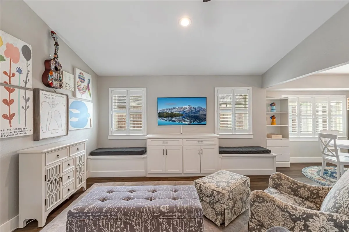 Living area featuring recently added built-in cabinets.