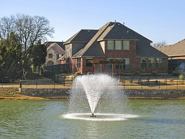 Tucked inside the little community is a private neighborhood pond for all the neighbors to enjoy
