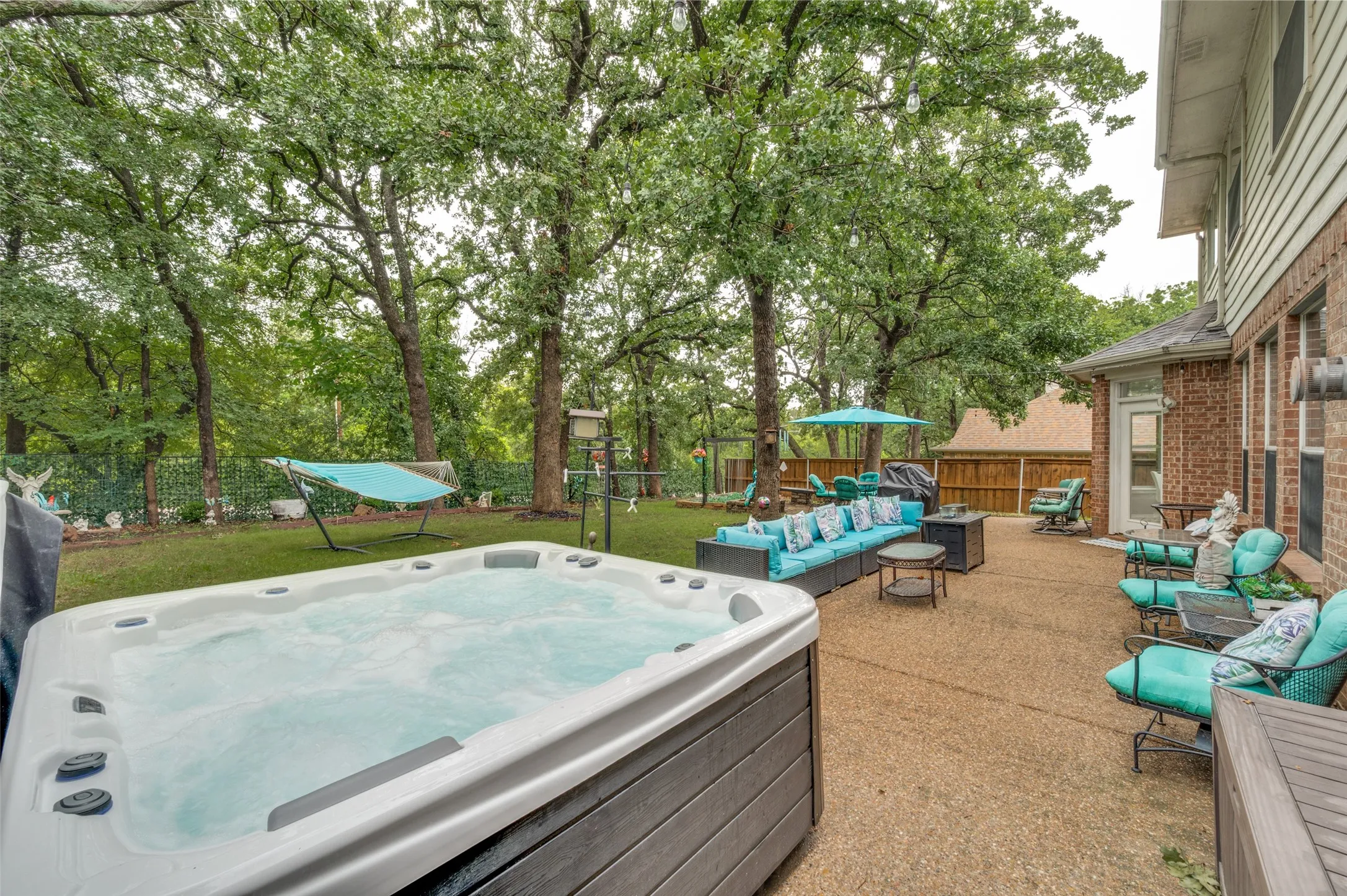 Step outside your back door to another feature of this exquisite backyard. Your own private spa/hot tub which is included in the sale of the house. The Spa/hot tub is less than 2 years old and includes many great relaxing features.