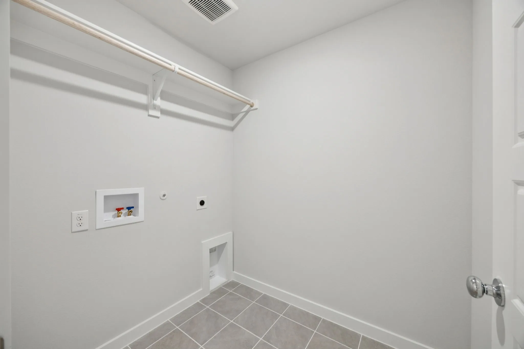 Utility Room in the Hadley home plan by Trophy Signature Homes – REPRESENTATIVE PHOTO