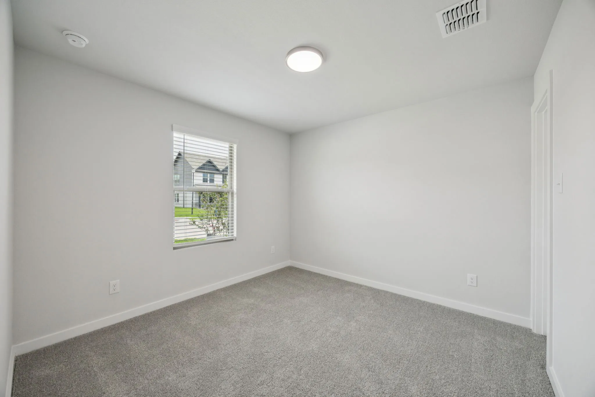 Bedroom in the Hadley home plan by Trophy Signature Homes – REPRESENTATIVE PHOTO