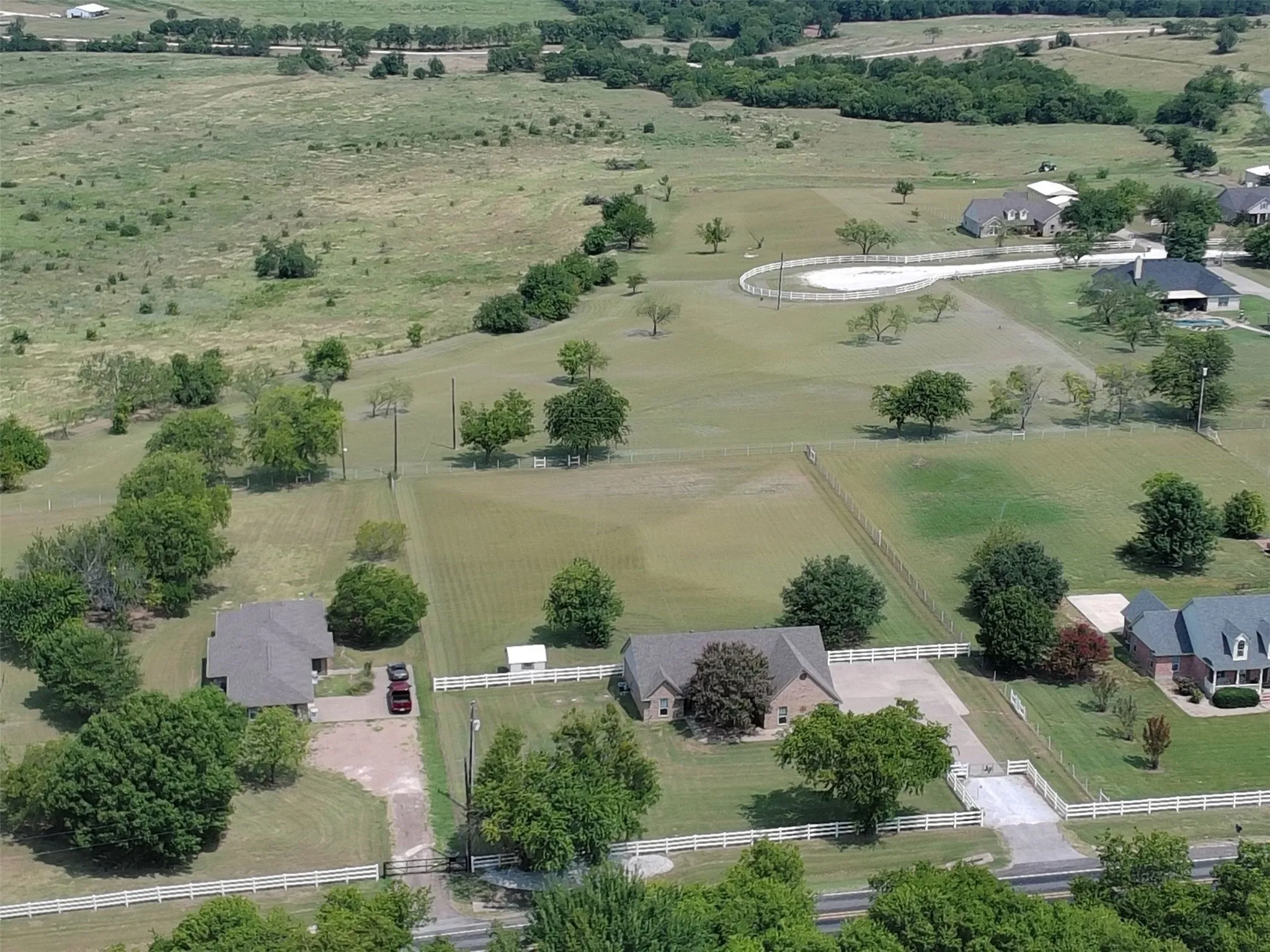 Beautiful view of the home and the entire 5.75 acres - The cul-de-sac in the back on top right provides a private entrance to the back 3.75 ac