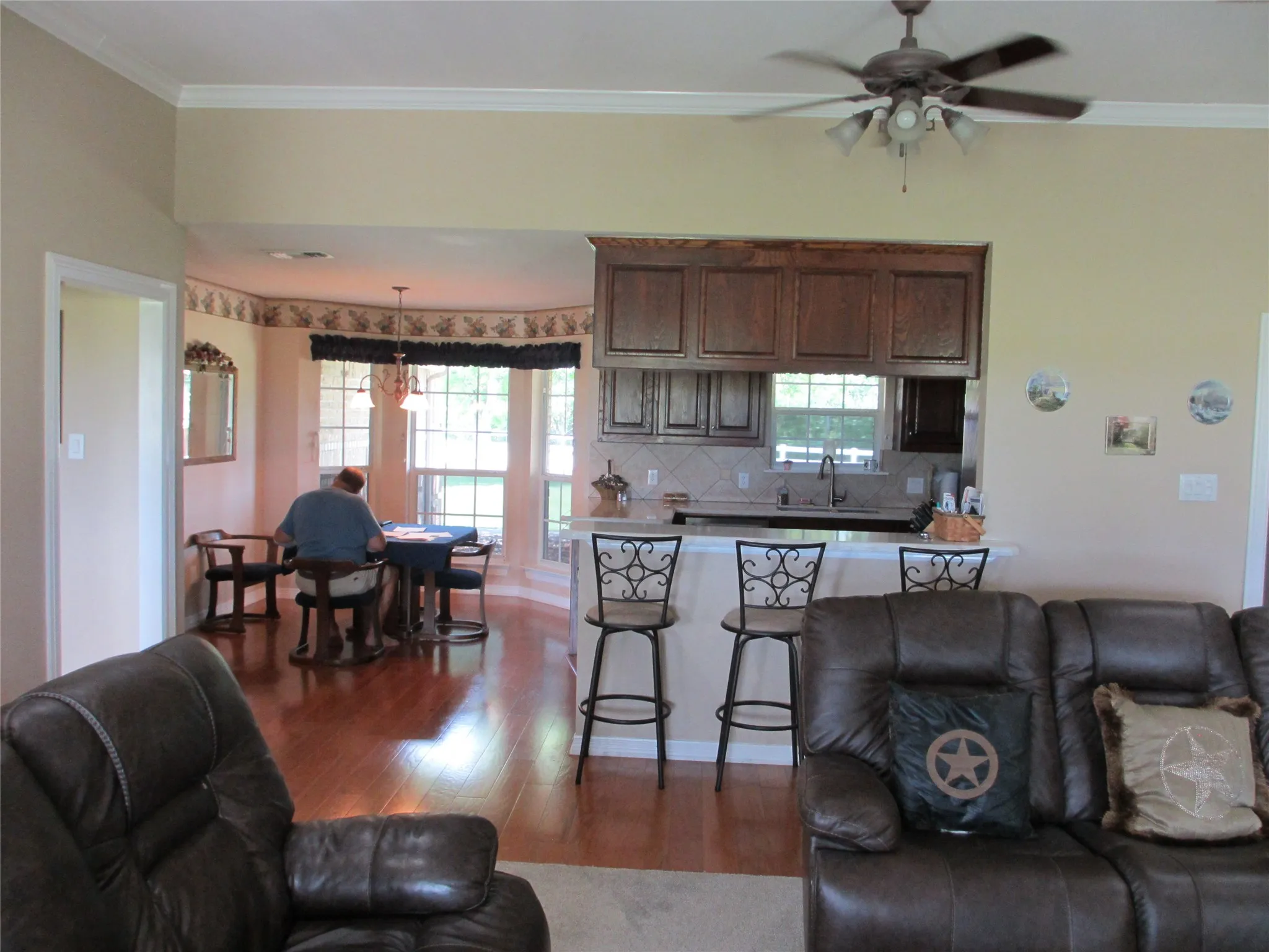Living room to the dining area and Kitchen