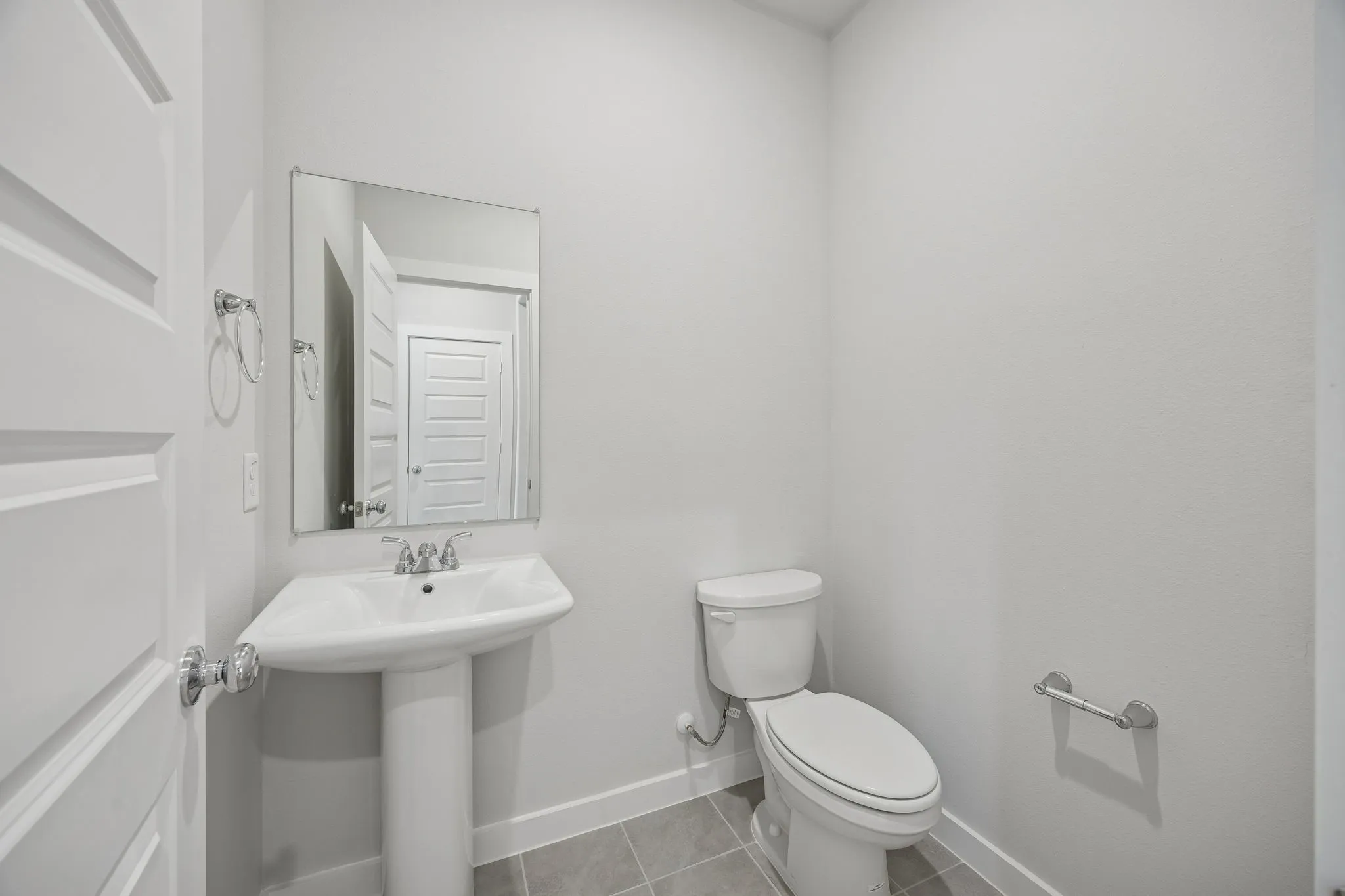Bathroom in the Oak II home plan by Trophy Signature Homes – REPRESENTATIVE PHOTO