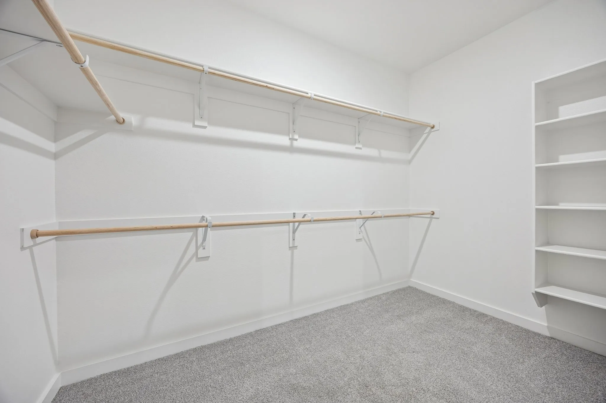 Primary Closet in the Oak II home plan by Trophy Signature Homes – REPRESENTATIVE PHOTO