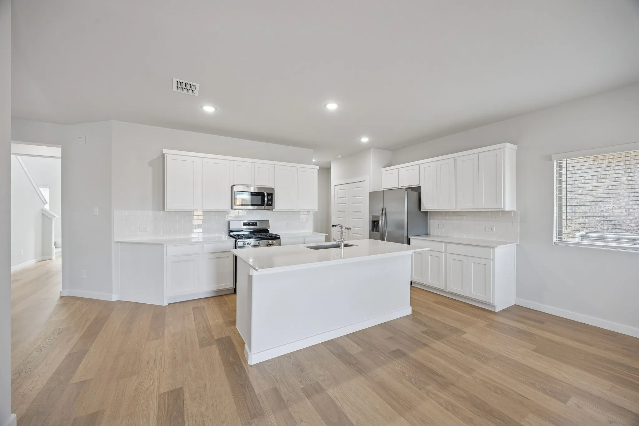 Kitchen in the Oak II home plan by Trophy Signature Homes – REPRESENTATIVE PHOTO