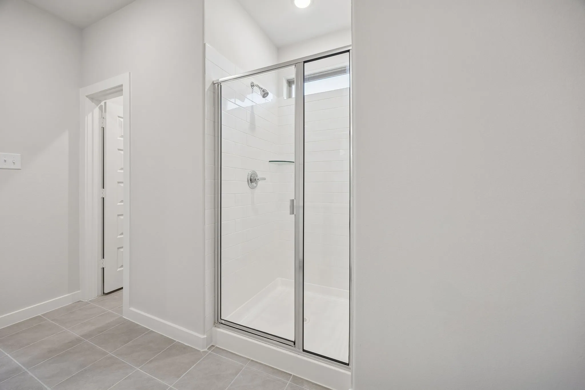 Primary Bathroom in the Oak II home plan by Trophy Signature Homes – REPRESENTATIVE PHOTO